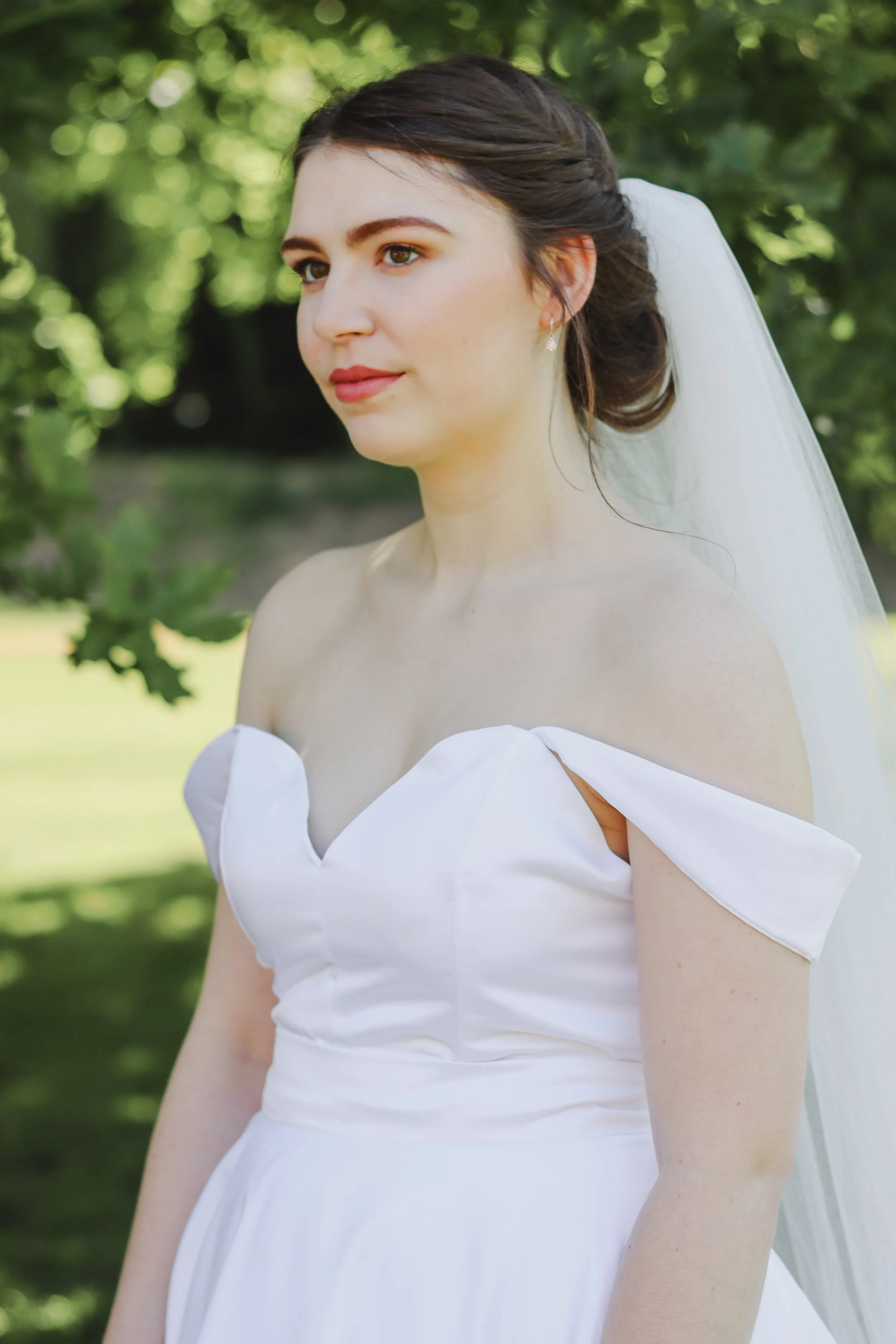 Natural bridal makeup with glowing skin and soft neutral eyes