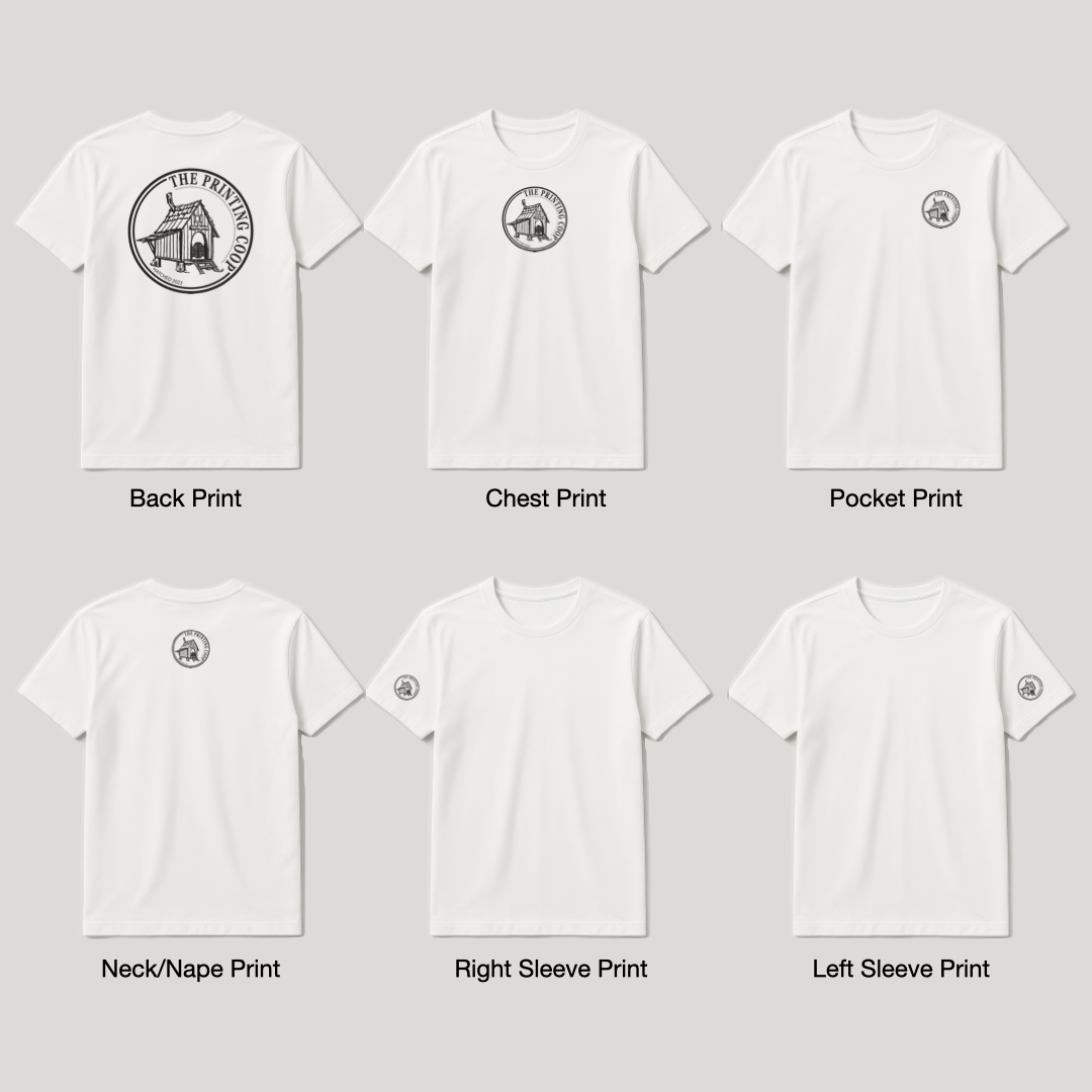 Six white T-shirts with various black prints and labels showing different placements of a logo featuring a house and the text 'The Printing Co-Op'.