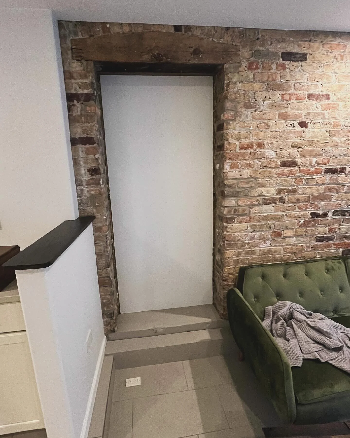 Closed up doorway turned into a functional and unique shelving space! Before &amp; After