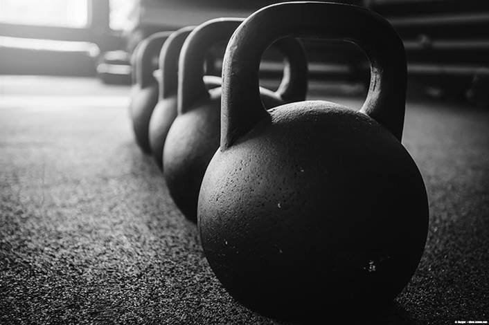 How can I get a full body workout with a kettlebell?