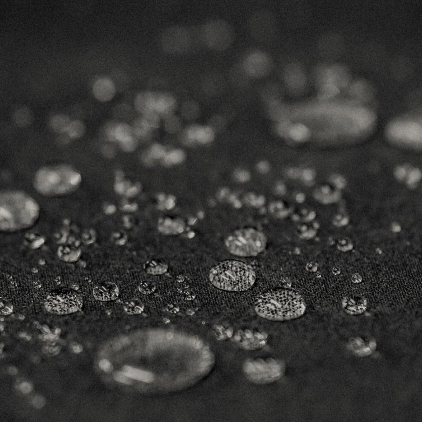 8.25 oz Mil Spec waxed cotton, shelter tent weight. This stuff wears hard, looks great as it ages, and keeps water out and body heat in. 

Just like a good tent. 

Our standard issue Isle of Man is lined in 24 oz Melton wool. It&rsquo;s about 5.5 lbs