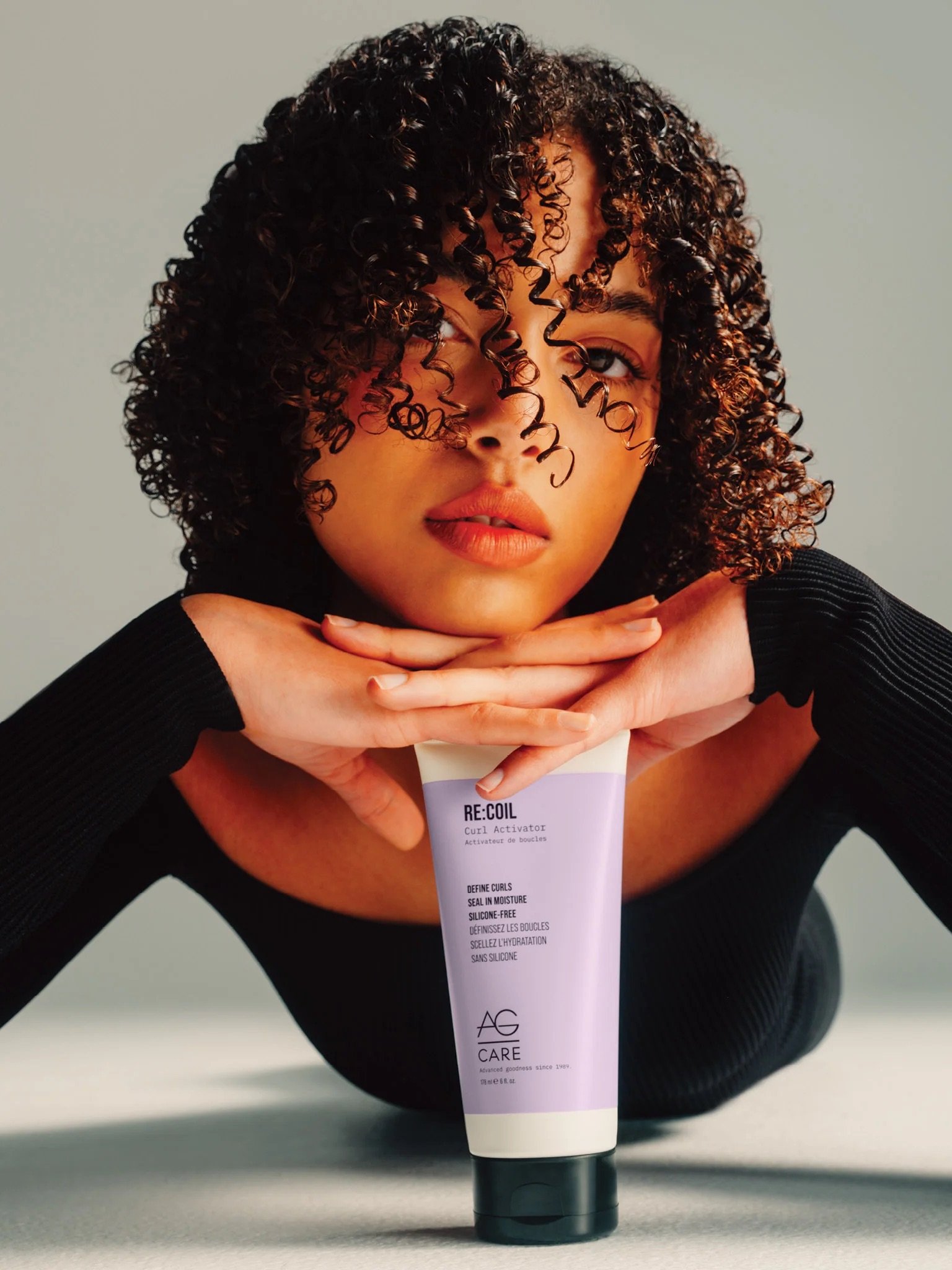 AG Care Recoil Curl Activator_with Curly Haired Model.jpeg