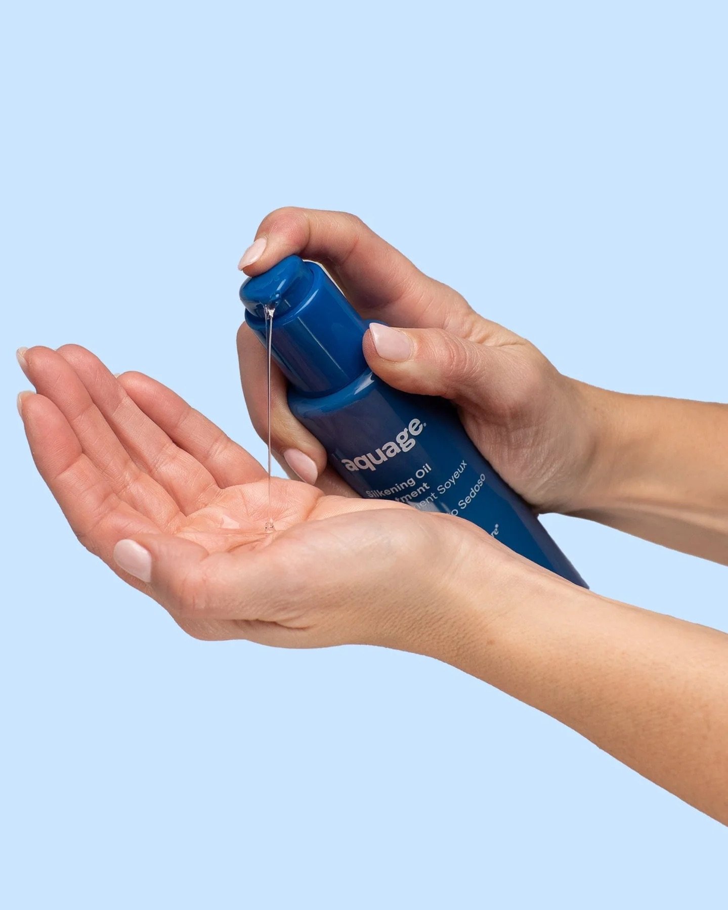 Aquage-SeaExtend-Silkening-Oil-Treatment-4.5oz-in-use.jpeg