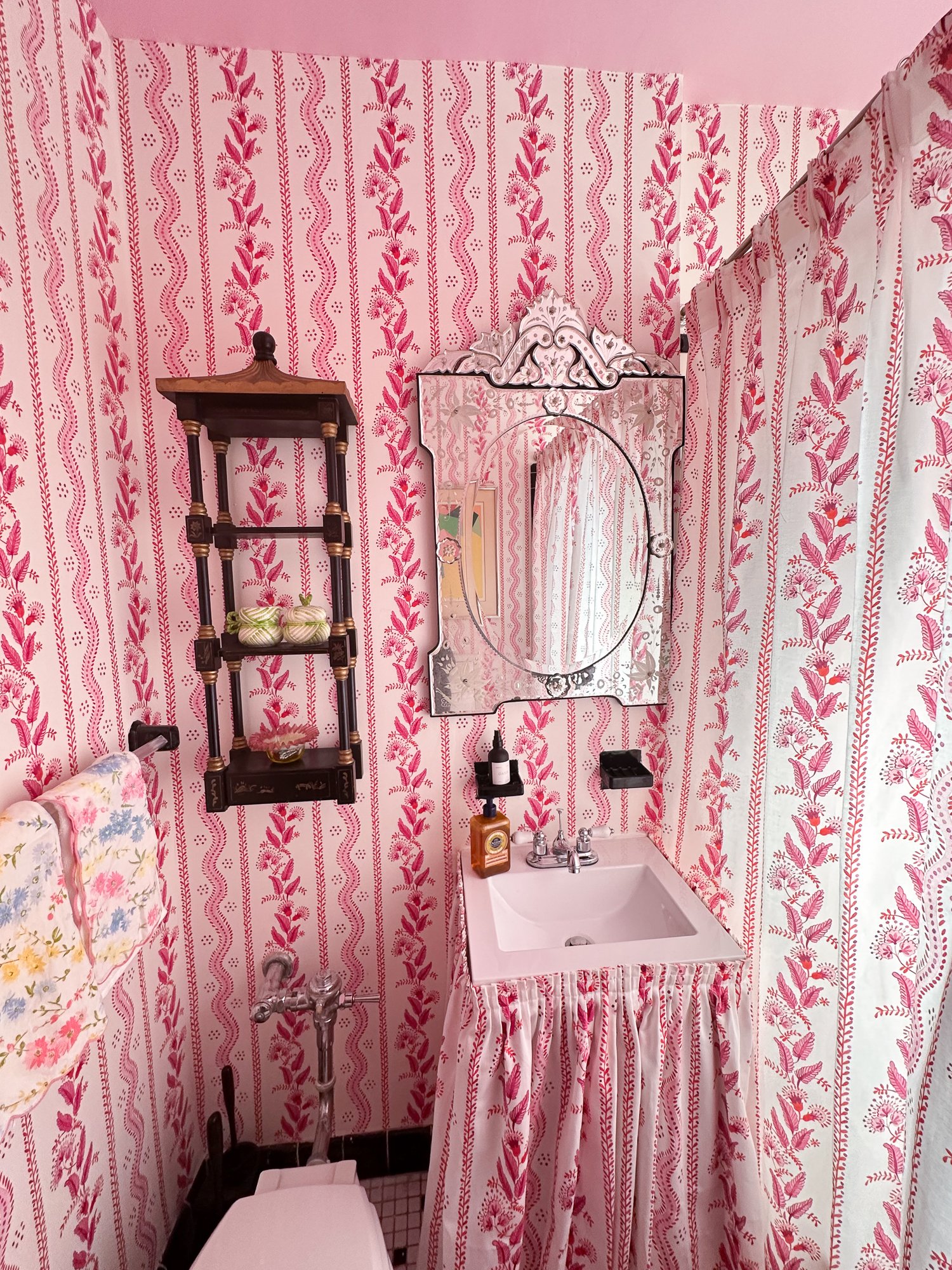 Pattern on pattern wallpaper bathroom