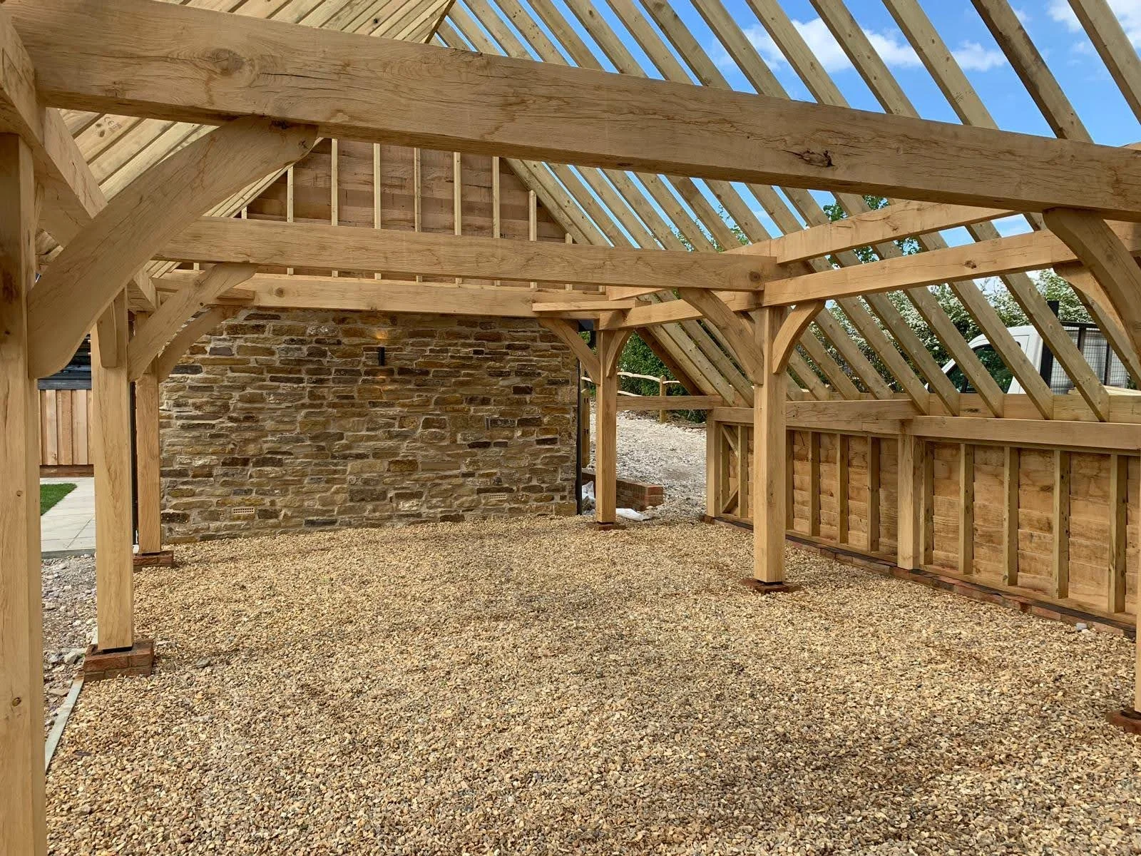 Inside a CNC-machined oak framed garage