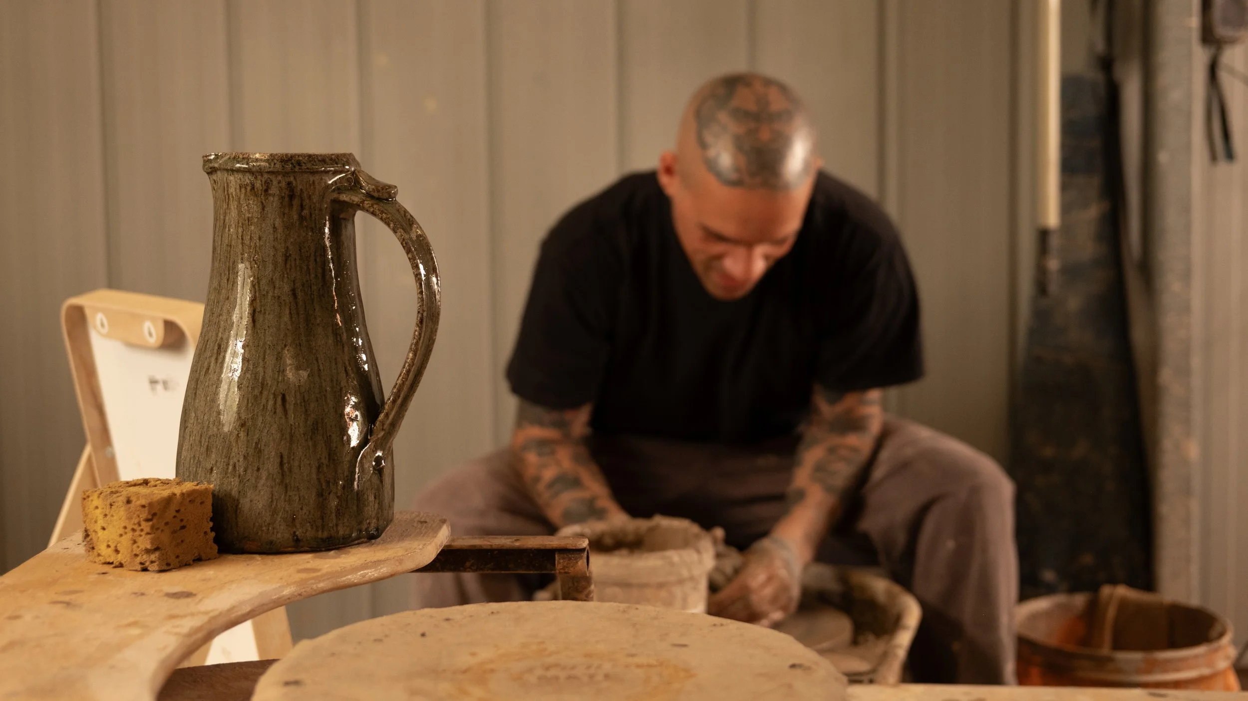 Tall stoneware ash glazed jug
