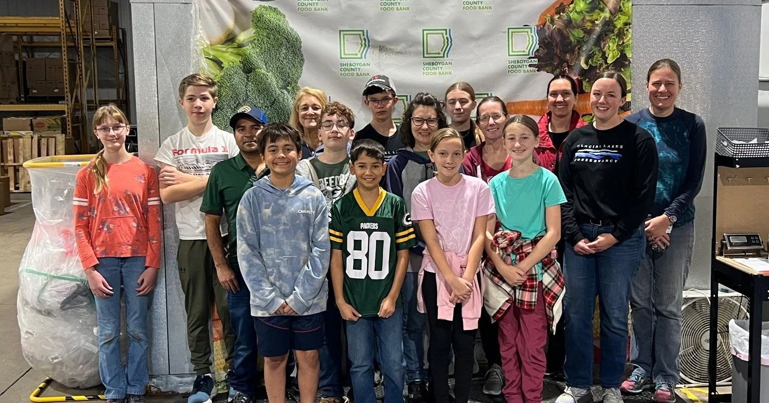 This past weekend, our Middle School Leadership Team volunteered at the Sheboygan Food Bank. Their work included organizing food, cleaning trucks, and supporting the important efforts of the food bank staff.

We are proud of these students for demons