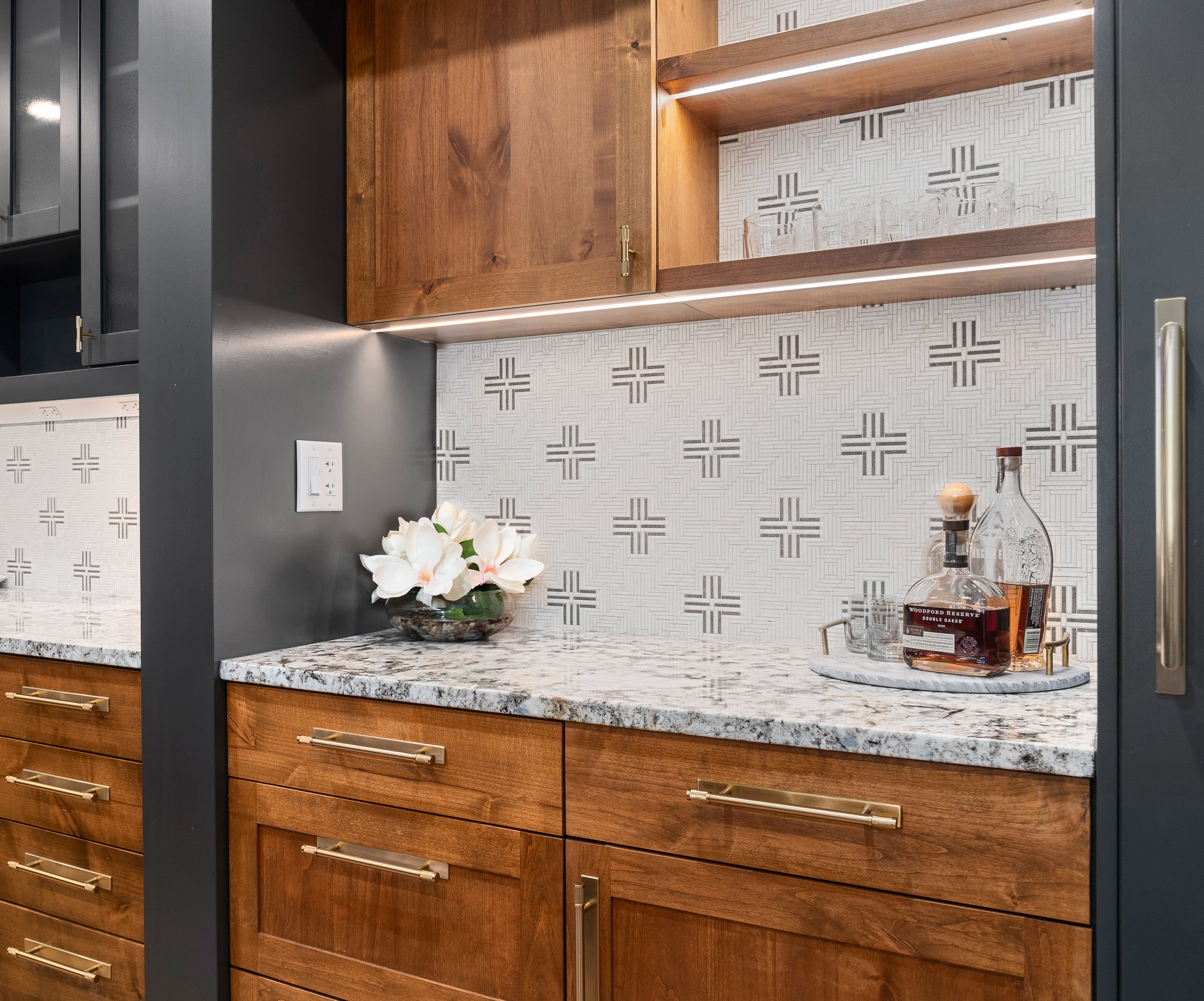 Updated Kitchen with stone mosaic backsplash, painted cabinets