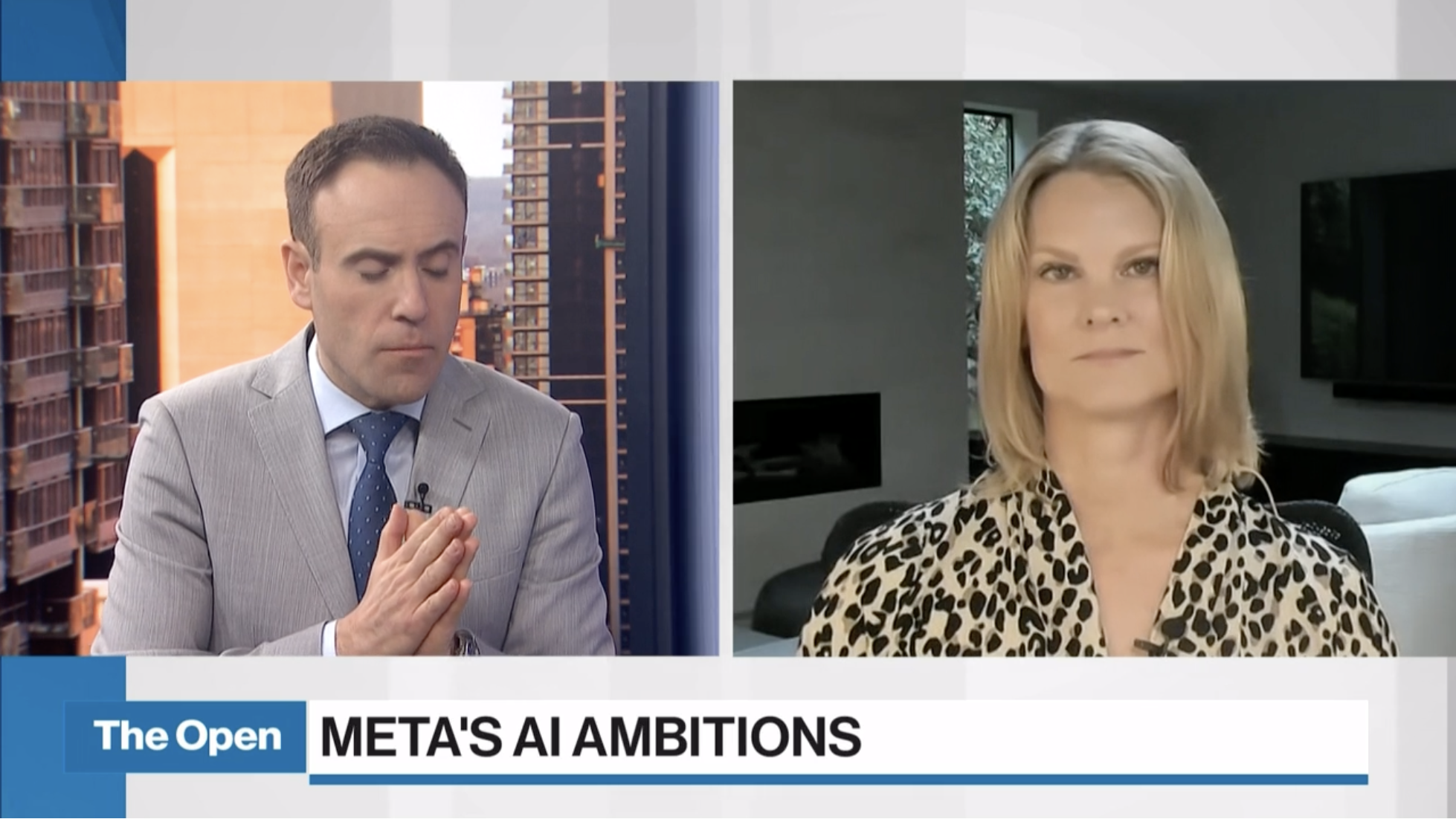TV interview split-screen; man in suit on left, woman in leopard print blouse on right; "The Open: Meta's AI Ambitions" headline.