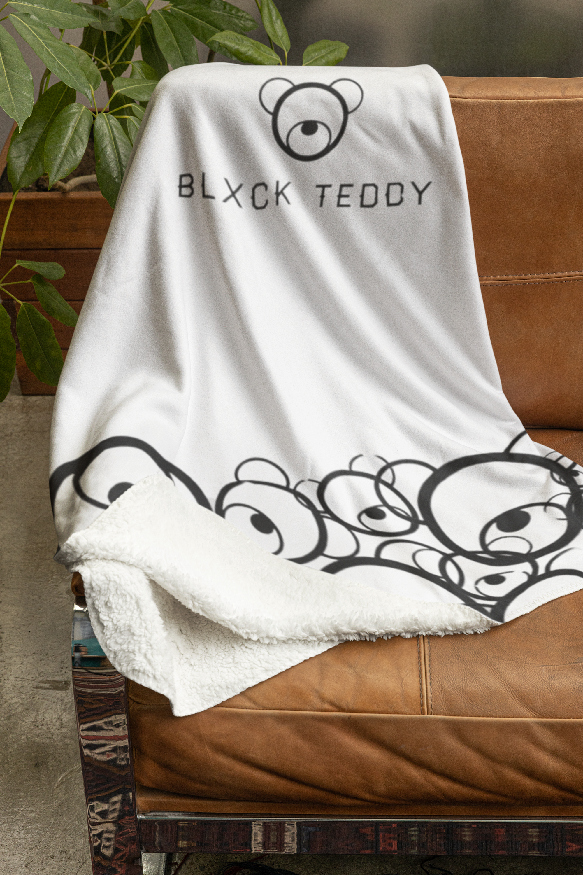 mockup-of-a-sherpa-fleece-blanket-placed-on-a-couch-m35706.png