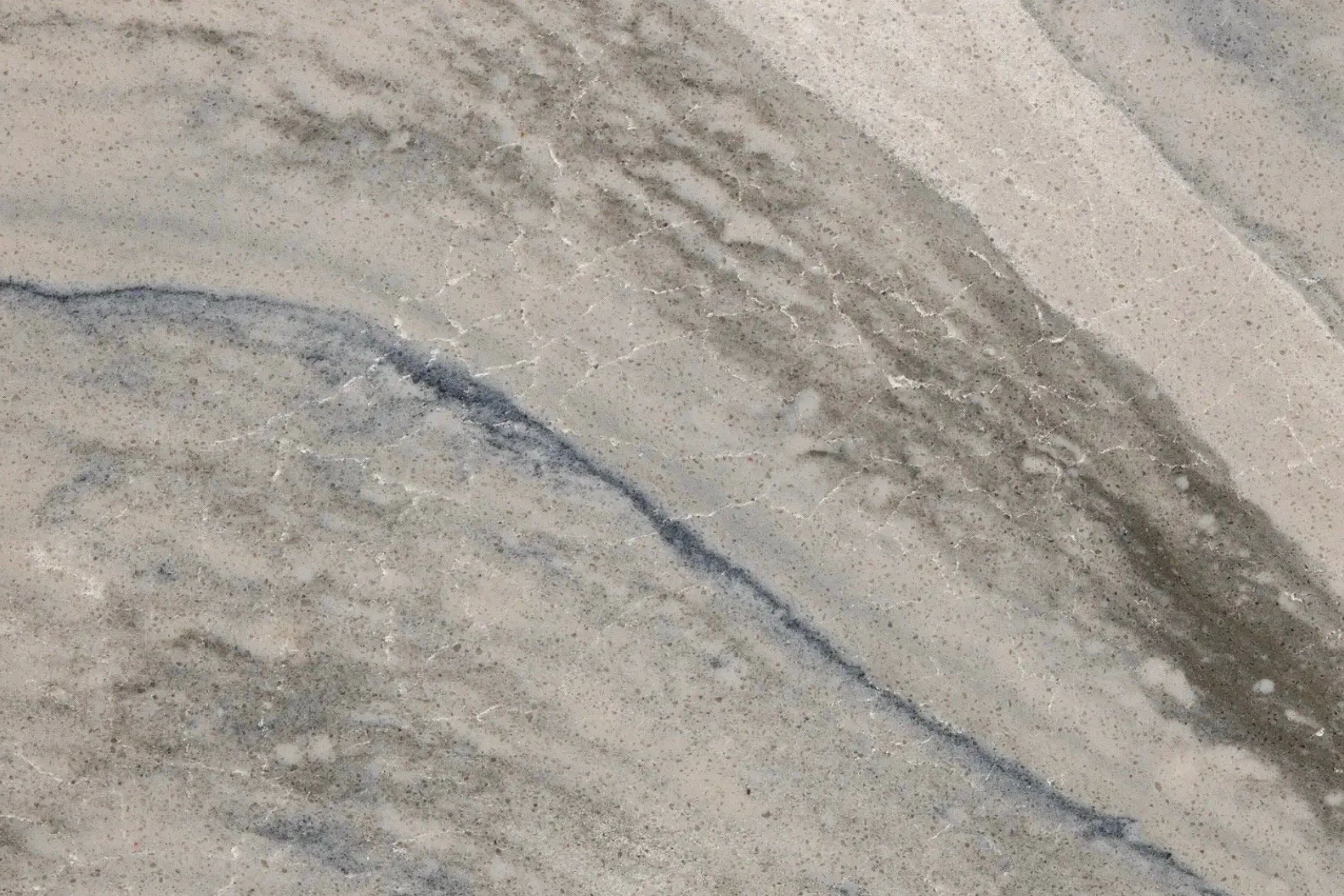 Close-up of a marble surface with gray and white veining.