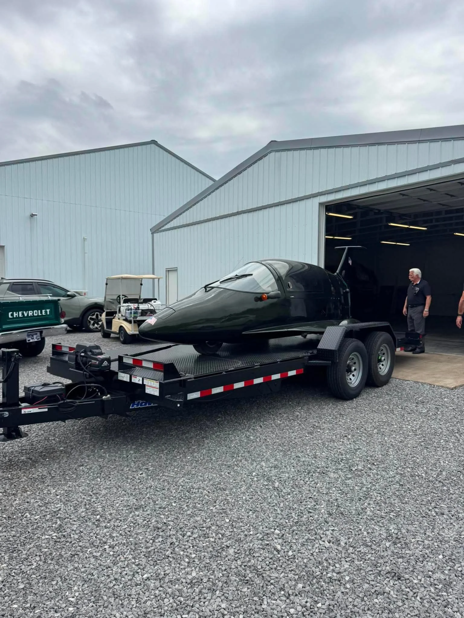 A motorcycle loaded on a 20ft power tilt trailer rental in Knoxville, TN