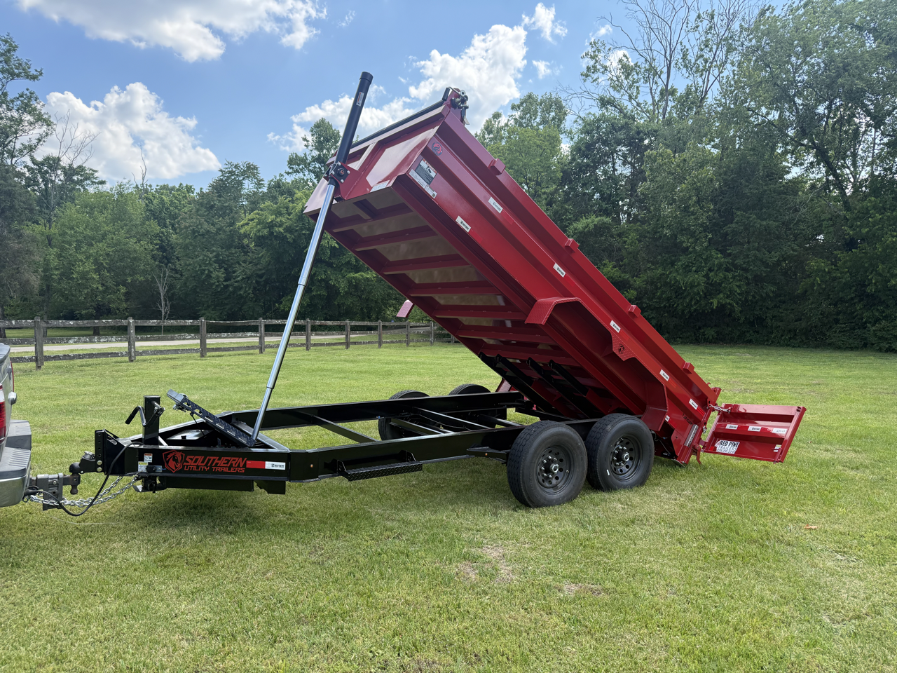 7 by 14 dump trailer with the bed tilted up in Goodlettsville, TN