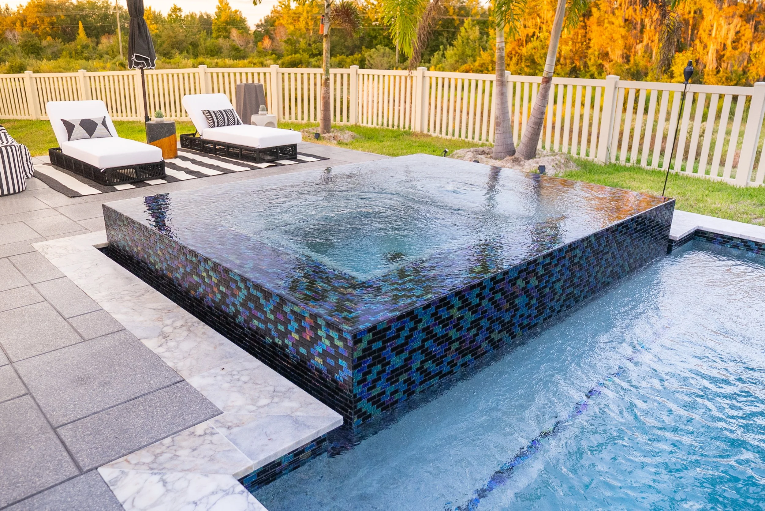 Raised spa and swimming pool