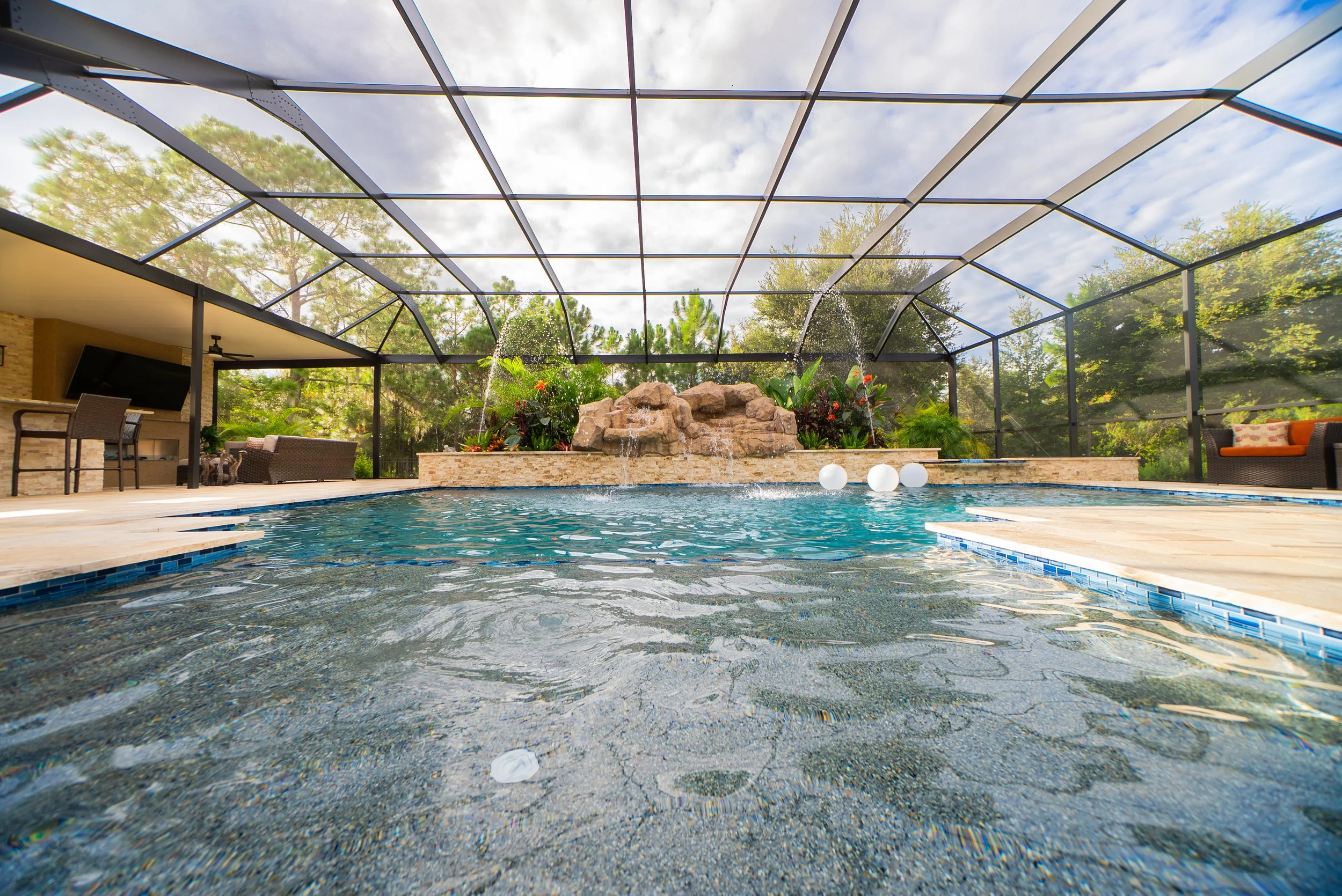Waterfall swimming pool feature