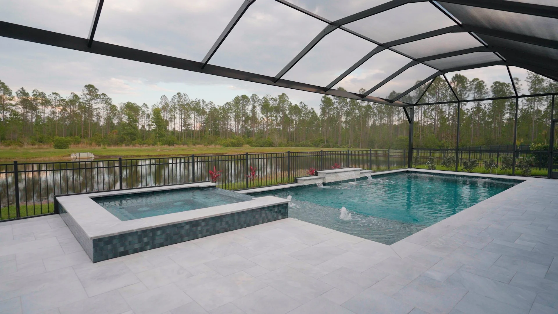 Custome swimming pool and spa with sun shelf, bubblers, sheer descent water features