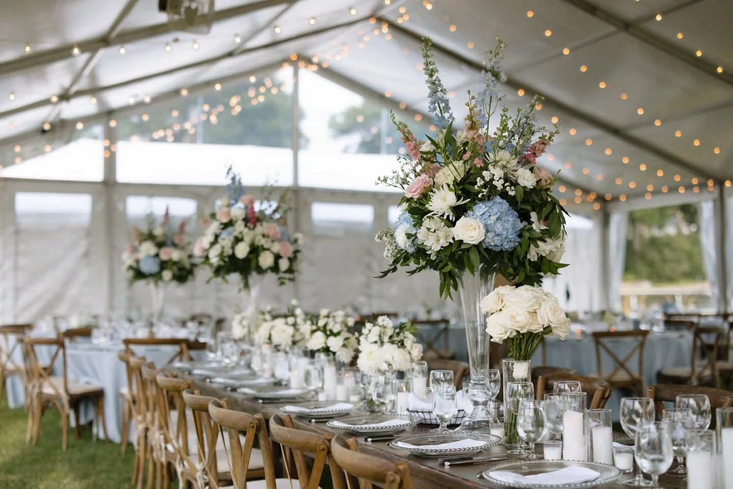 Soon we will enjoy outside time again in summer weather with green things and flowers! Soon! (I keep telling myself!) In case it feels far away right now, just picture your night as a guest at this wedding&mdash;on the lake, under a tent with a view 