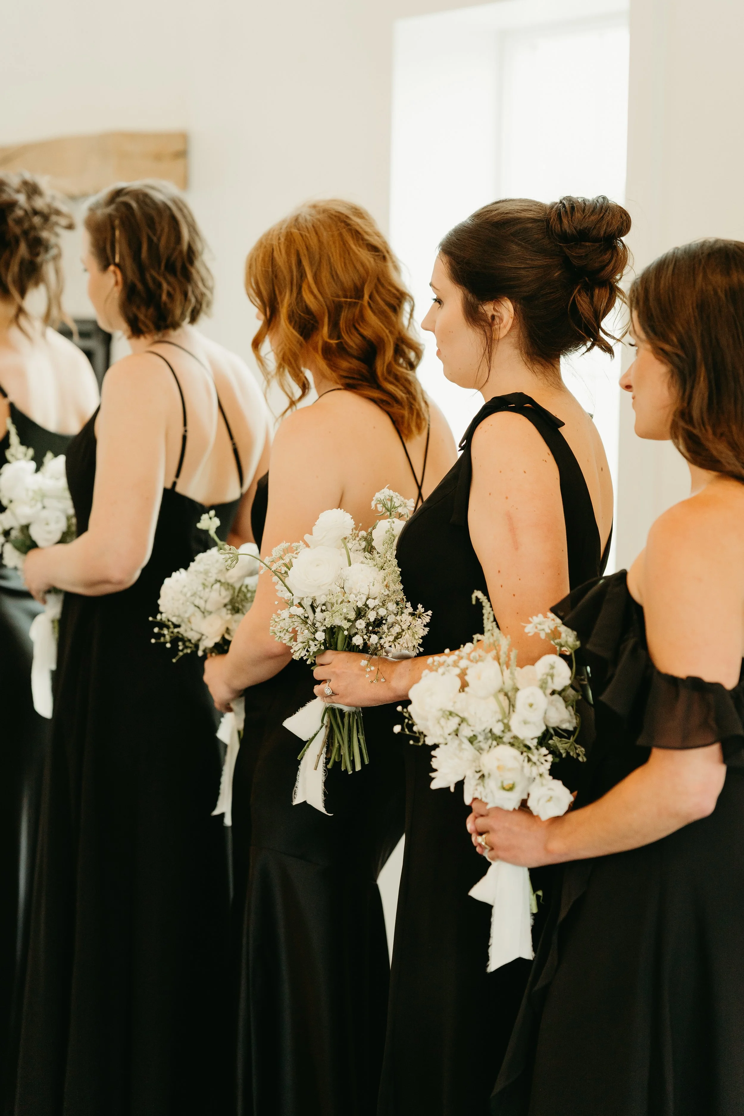 Black and white bridesmaid flowers