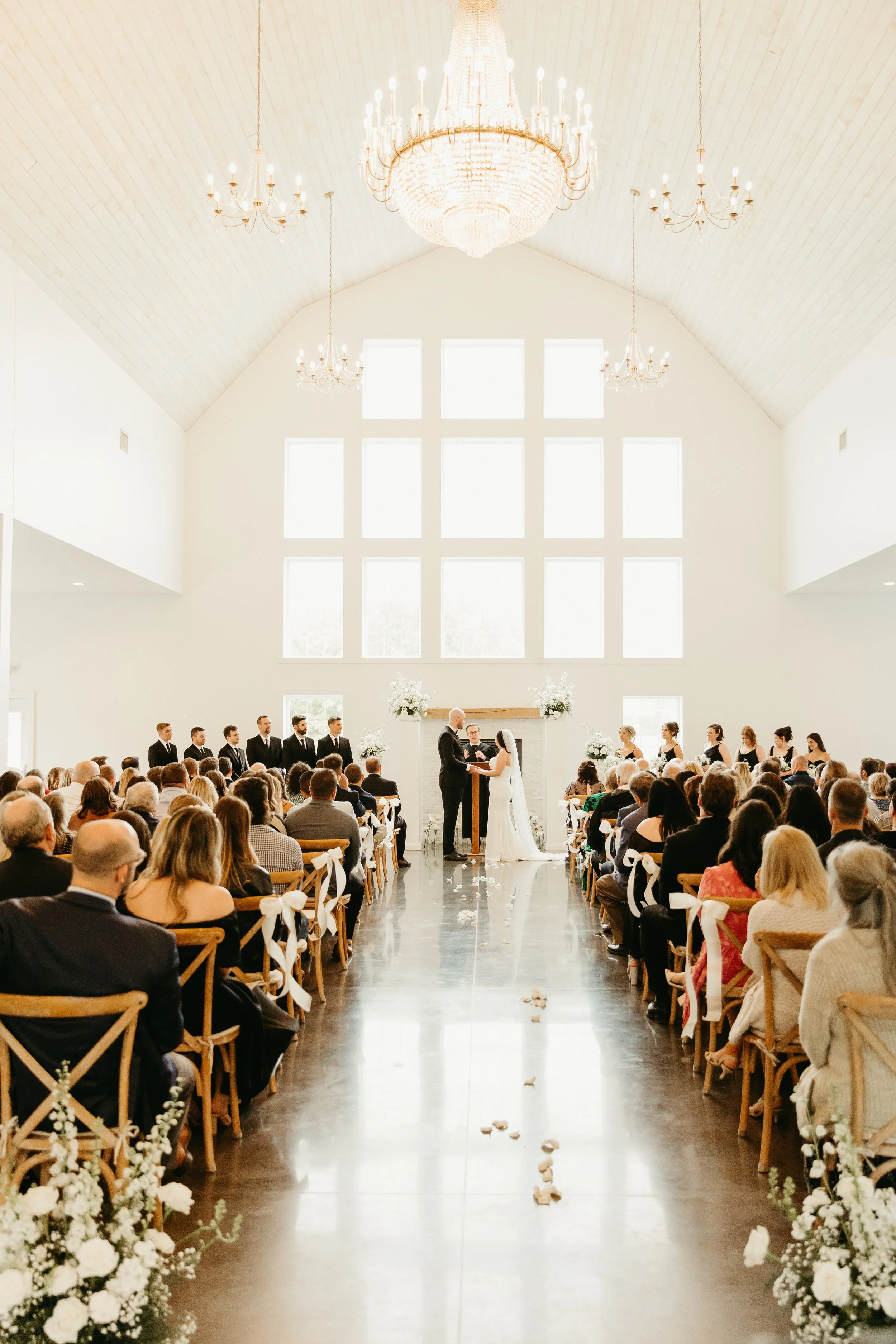 White barn wedding ceremony