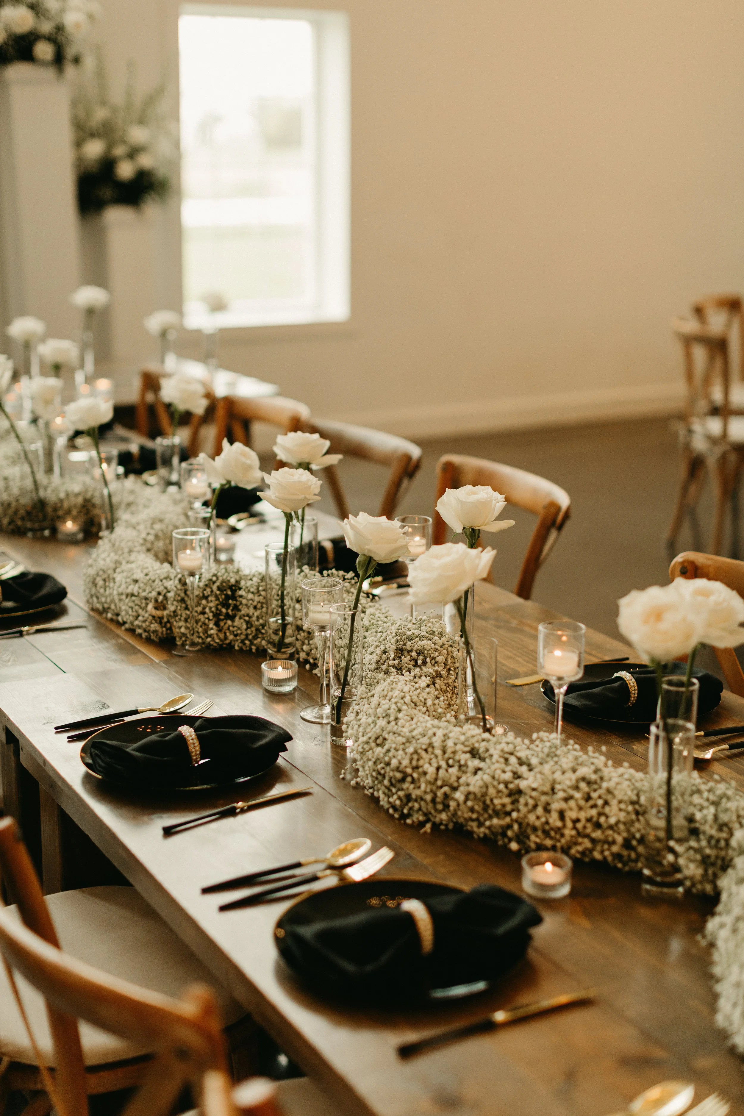 Baby's breath table runner with roses