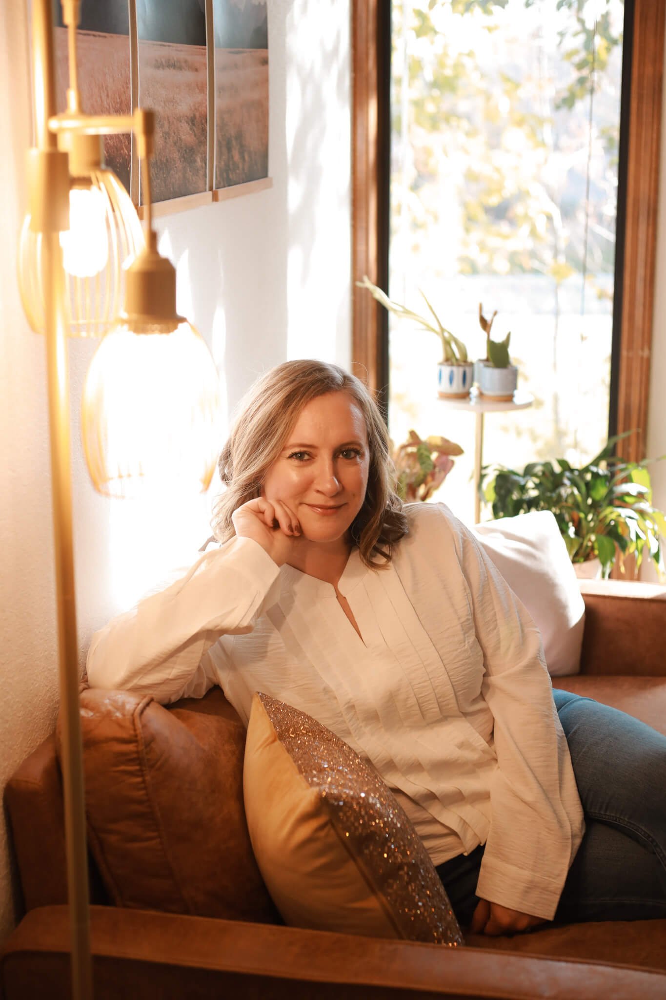therapist on couch smiling