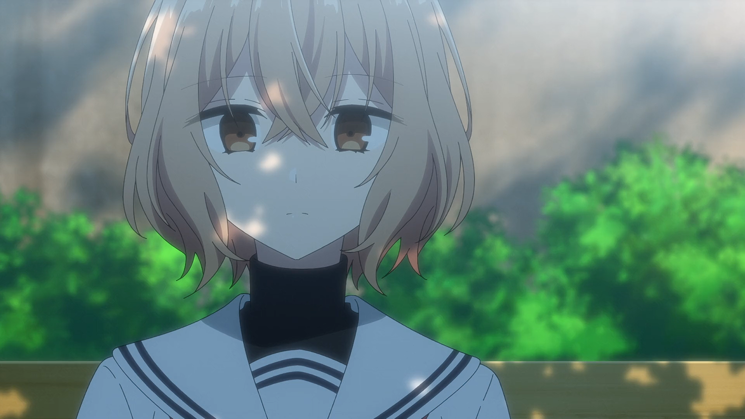 A shot of Hinako under the shade of a tree with a blank expression