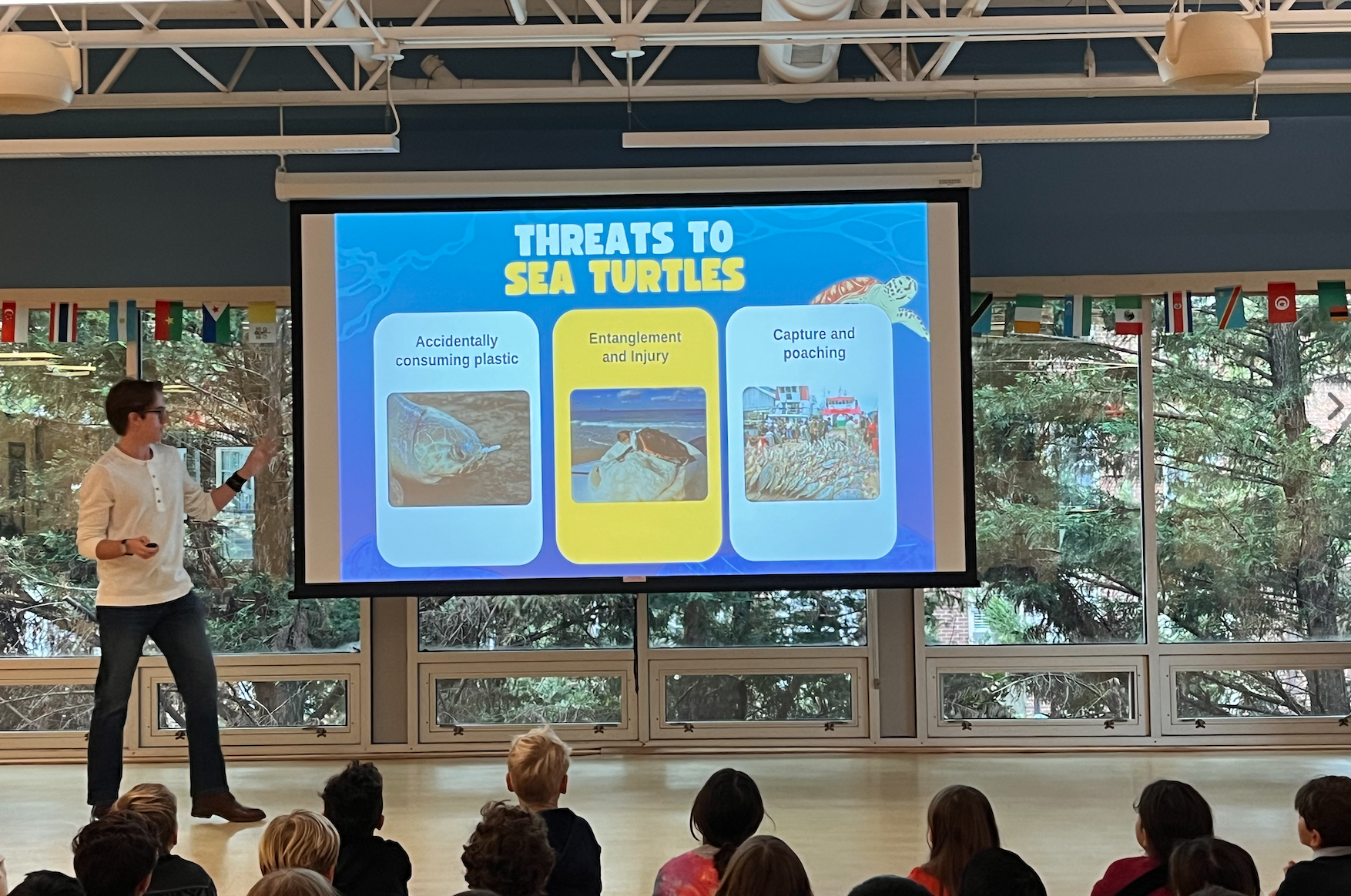 Grayson Houston-Henderson giving a presentation about the turtles