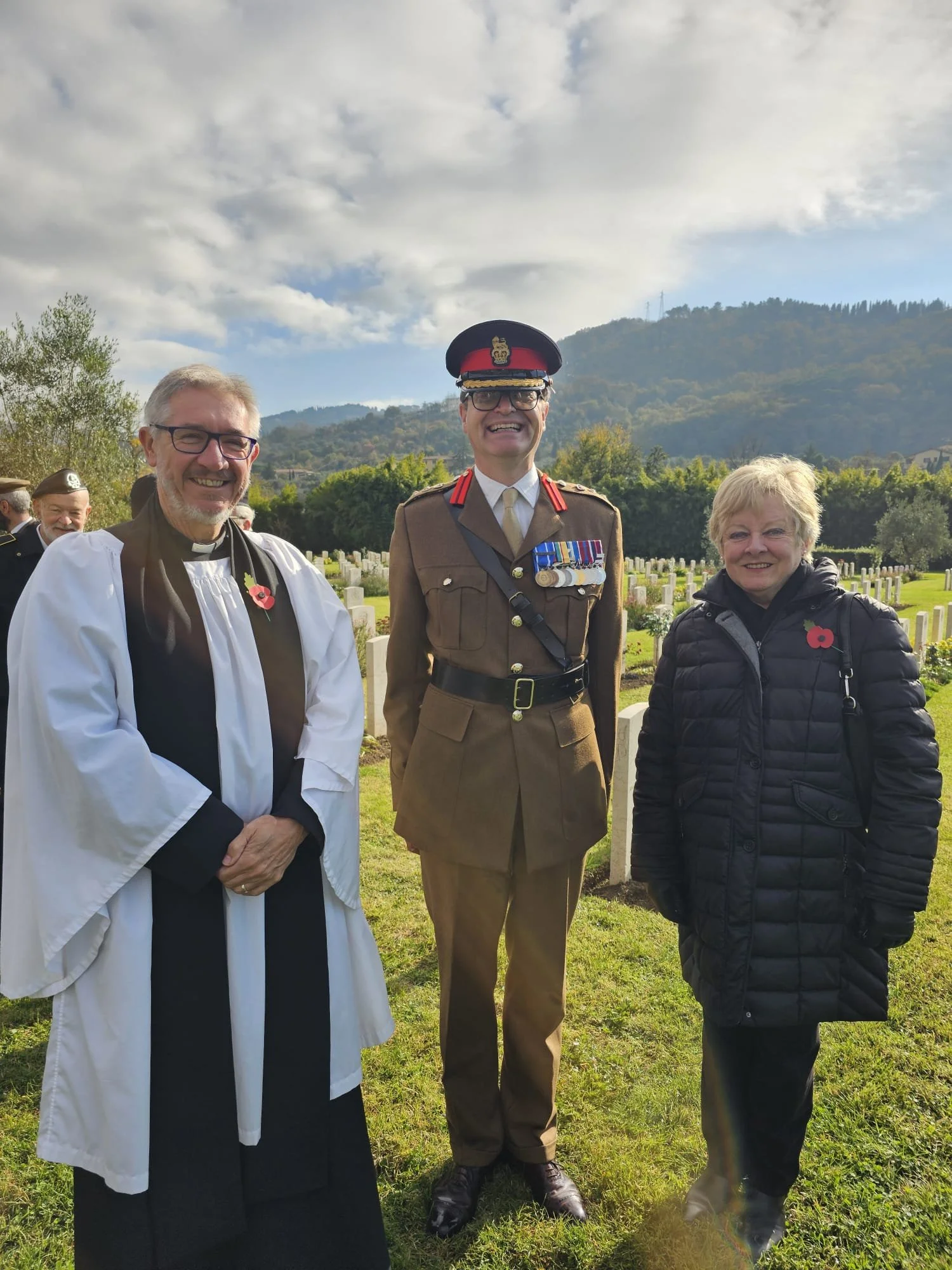 Father Chris with British Colonel John Godfrey and Sue