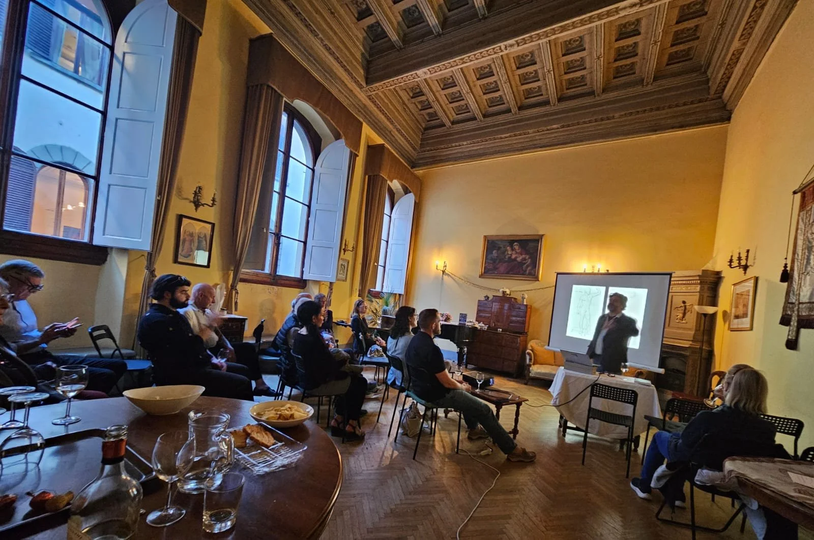 Coming together in the Salone, to hear from Jason Arkles about his novel 'Rude's Awakening'
