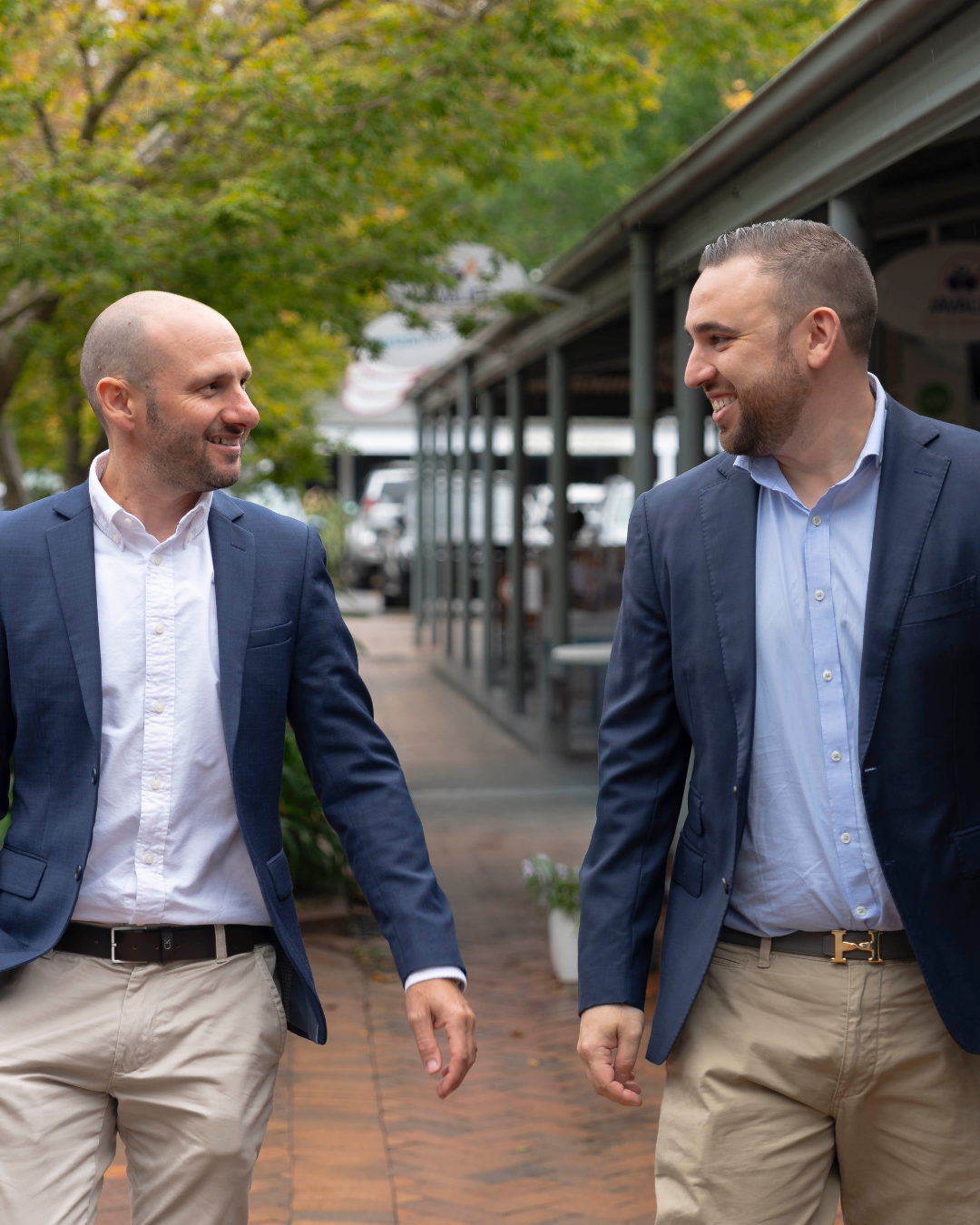 Two Shorebreak Finance team members walking together in Berry