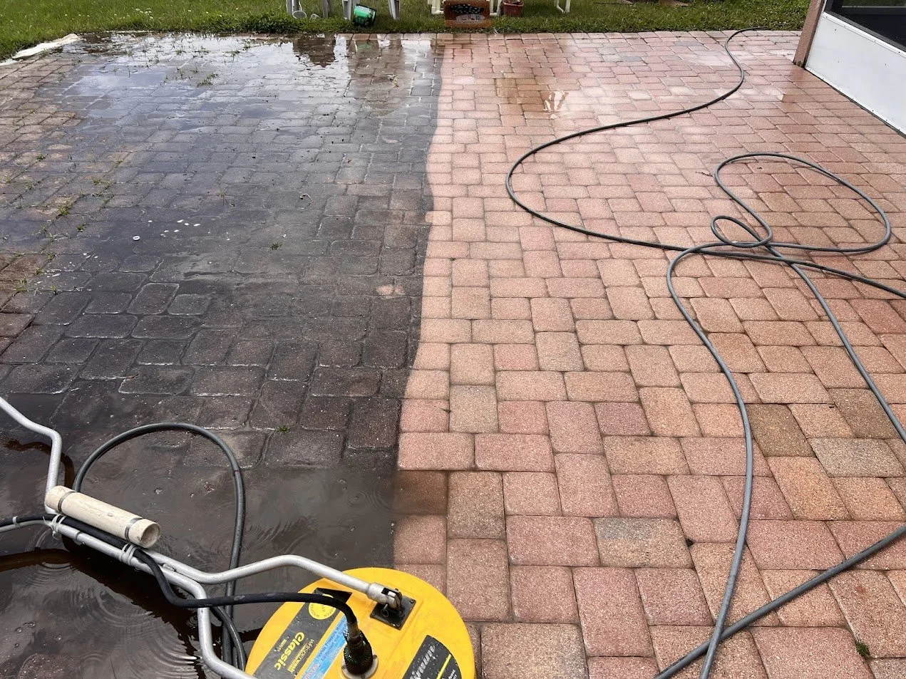 Driveway pressure washing cleaning service in Kissimmee, FL before and after