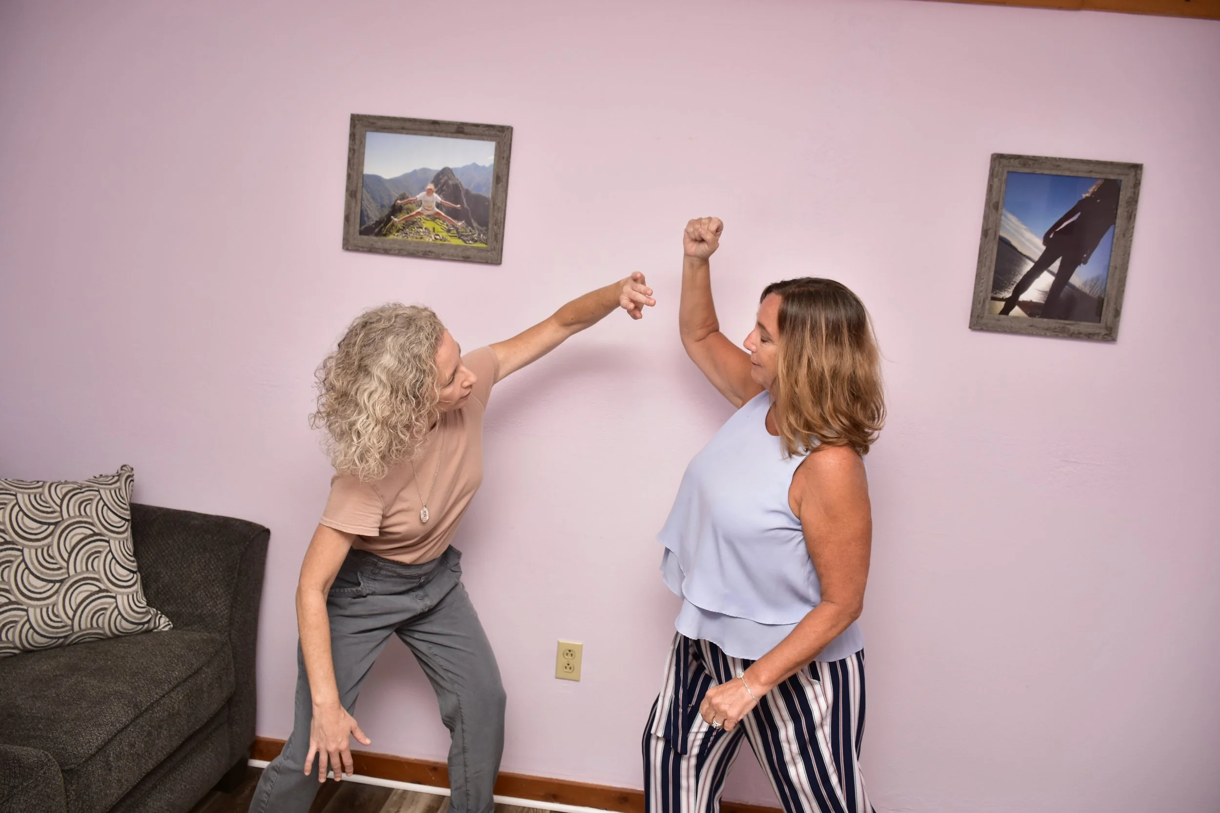 client appearing to fight against therapist who responds with calm