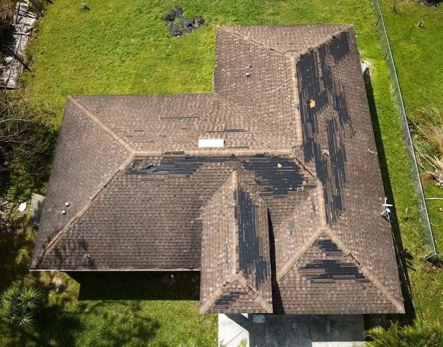 Damaged shingles after winter Ontario roof