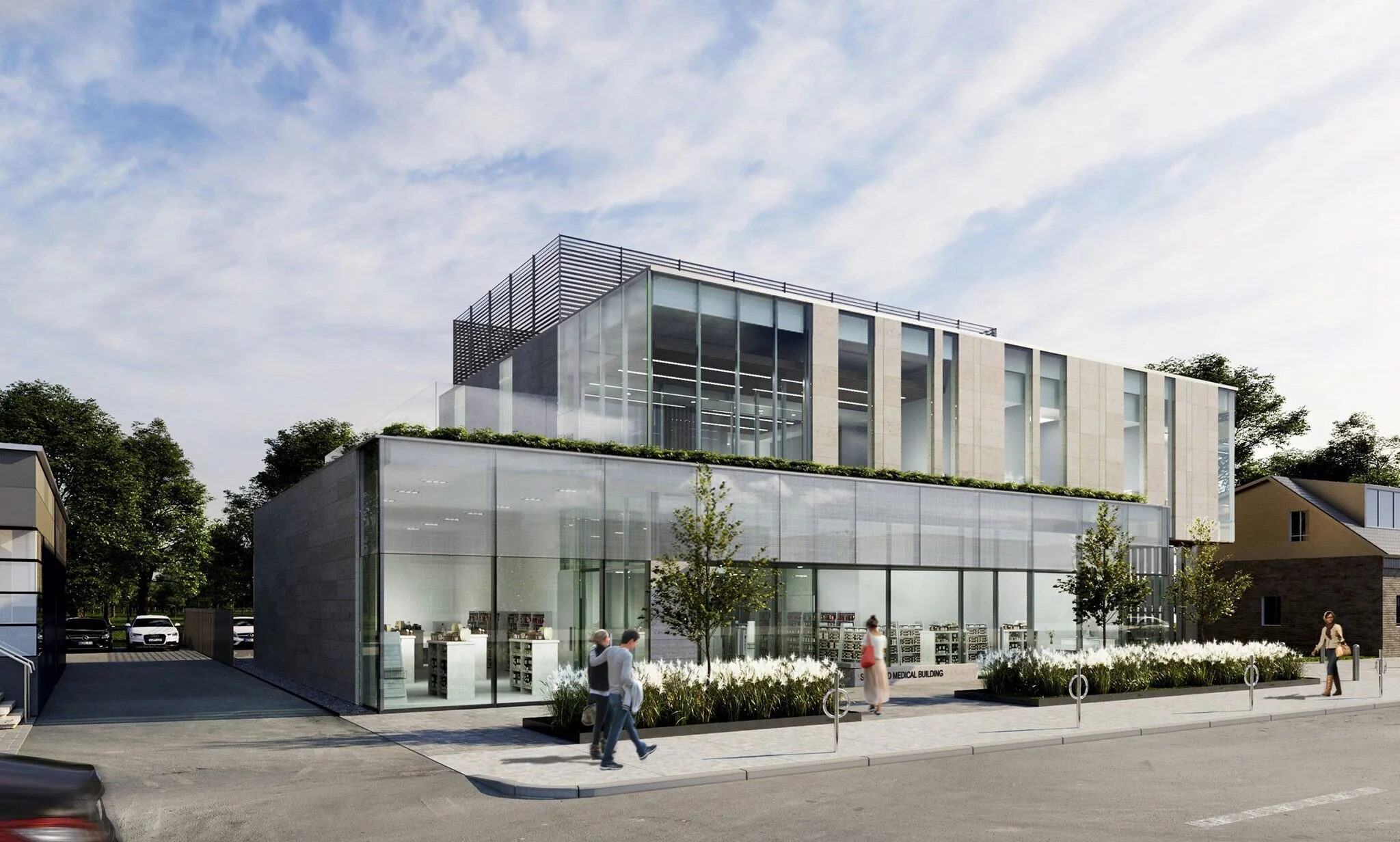 Modern medical building with glass facade and rooftop terrace, trees, cars parked nearby, and people walking on sidewalk under a partly cloudy sky. Wellbeing and wayfinding. Healthcare architecture. Inspiration for Toronto, Dallas and Park City.