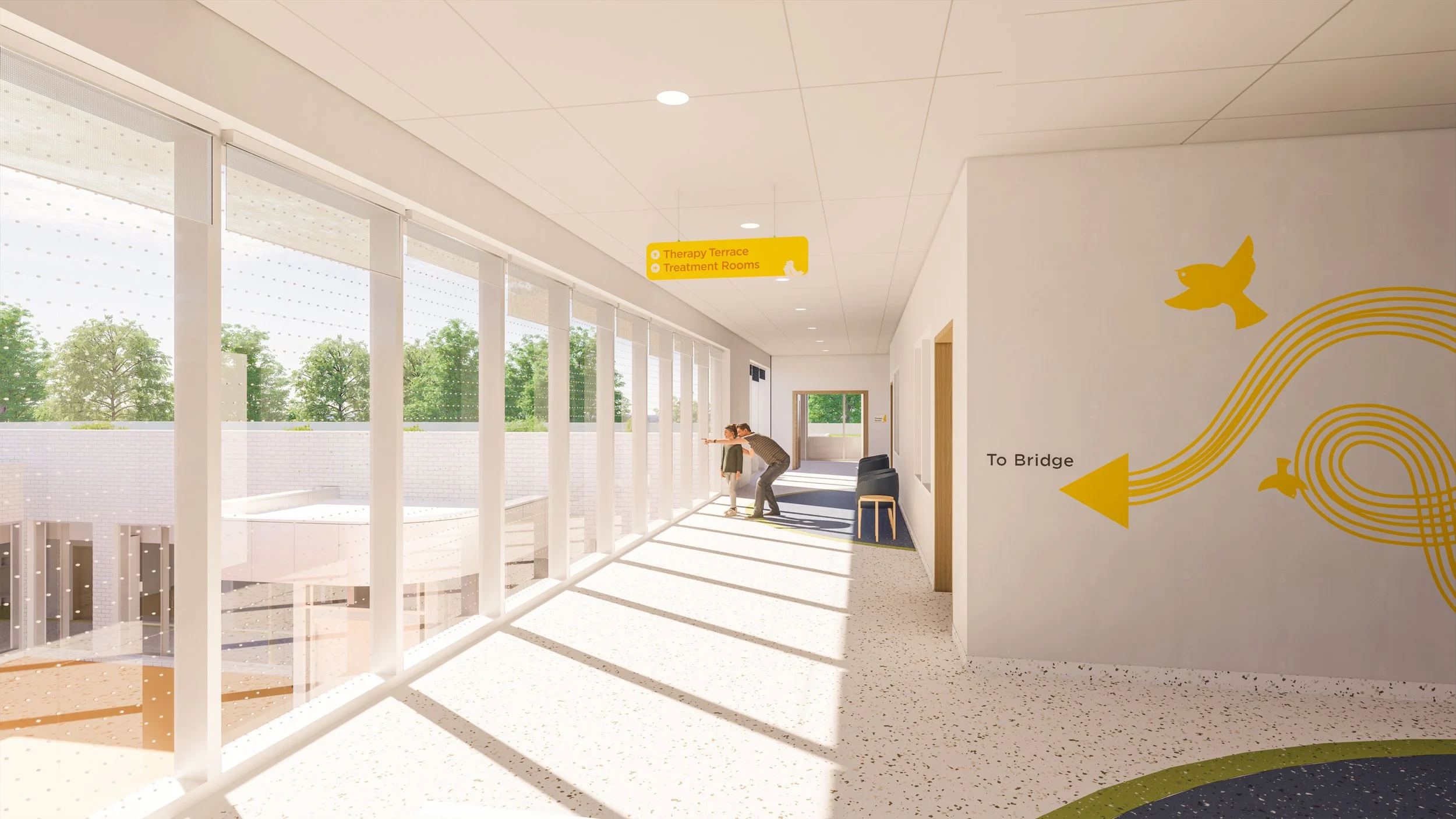A bright, airy corridor with large windows,, yellow directional signs overhead indicating therapy terrace and treatment rooms, and decorative yellow wall art with a bird and rainbow pattern, leading to a bridge. Toronto, Dallas, Park city.