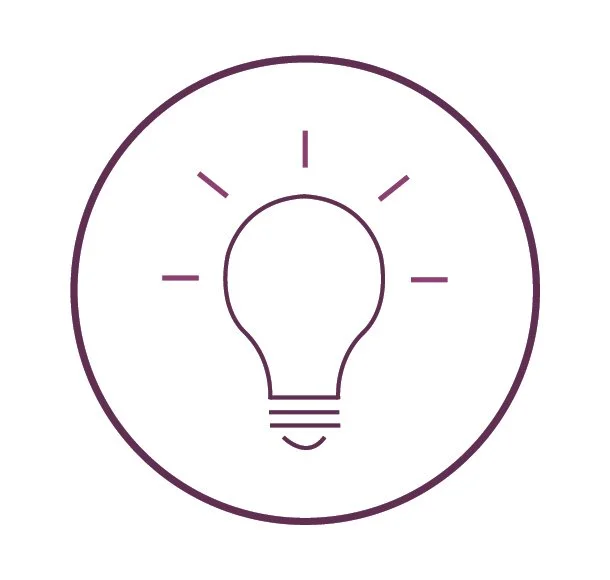 Outline of a light bulb with rays of light emanating from it, enclosed in a circle.