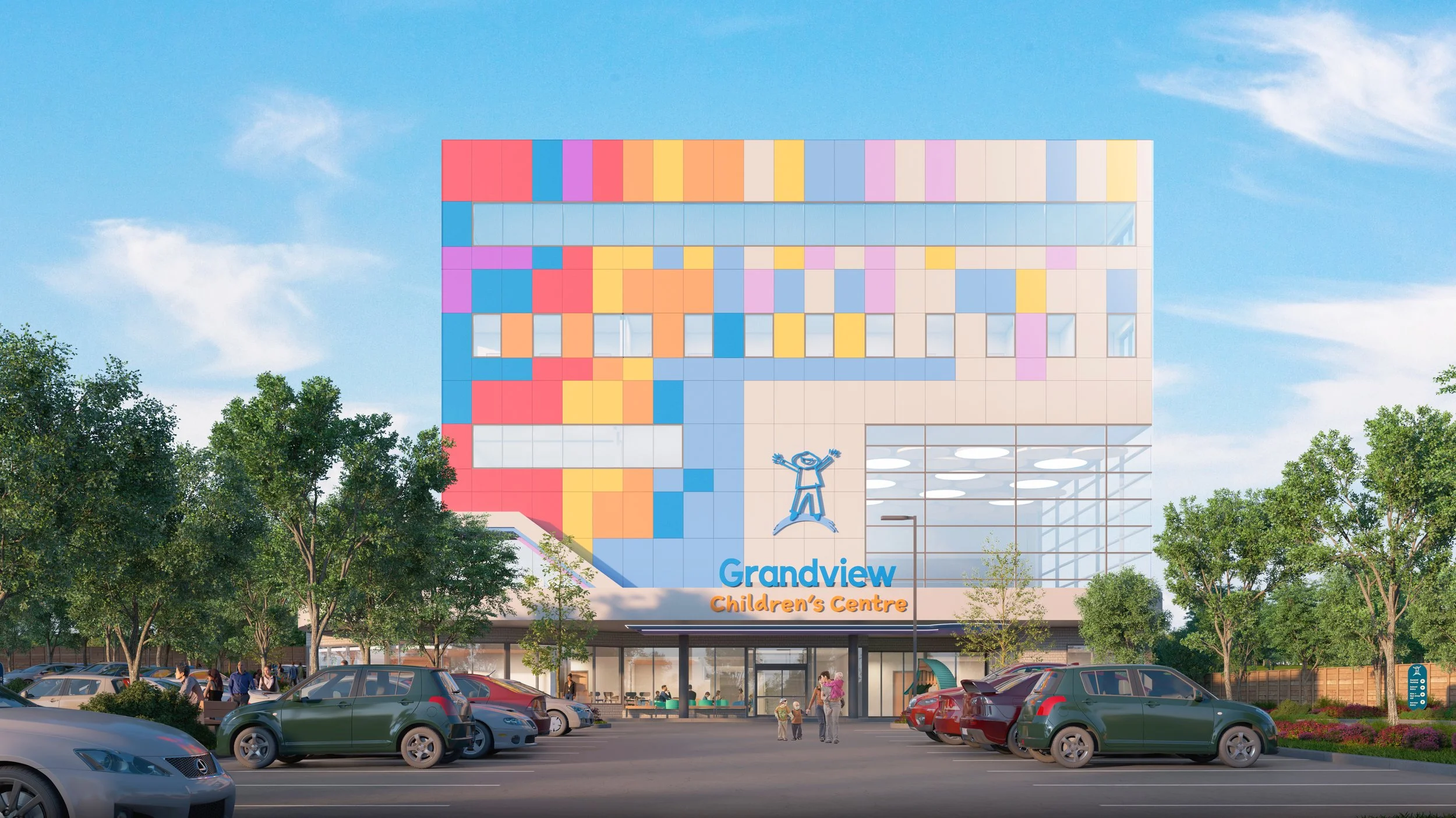 The modern multistory building is the Grandview Children's Centre. It has a colorful pixelated design on the upper floors, a logo and name on the front, and a parking lot and people in front of it. Inspiration for Toronto, Dallas and Park City.