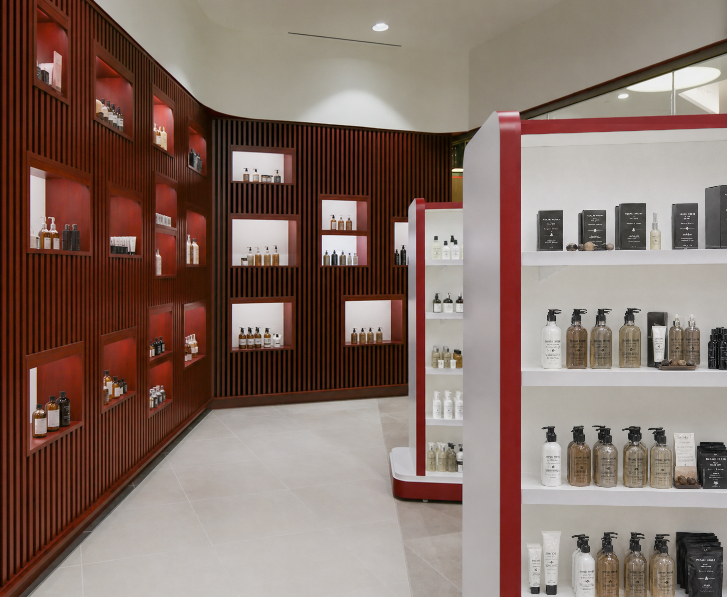 Interior of a store with wooden display shelves. On the right, white display shelves. The store has a clean design with tiled floor and well-lit ceiling. wellbeing and wayfinding. healthcare. salutogenicic. Toronto, Dallas, Park city, Texas, Miami.