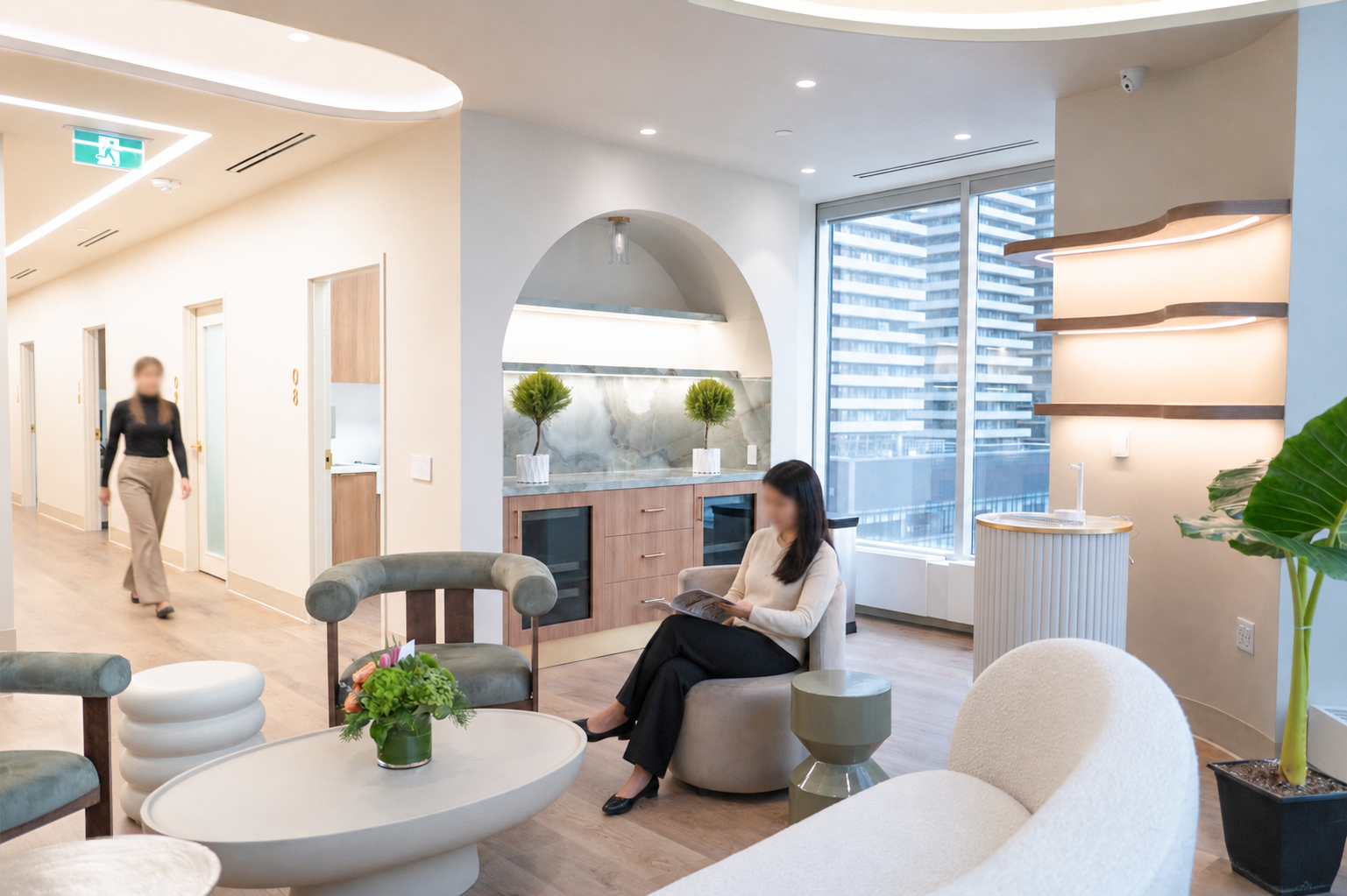 Modern lobby with seating area, large window view, decorative plants, and minimalist design.