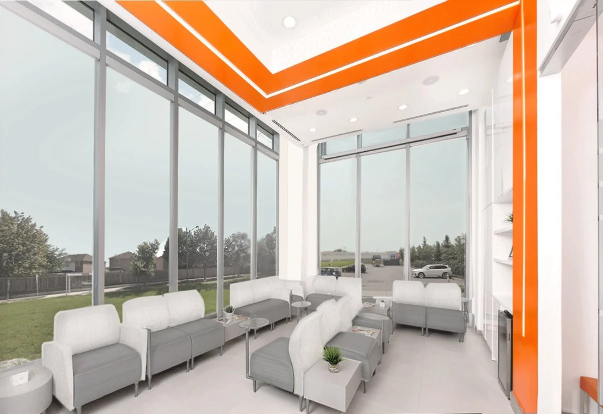 Interior of a modern medical or dental waiting room with white and gray seating, large floor-to-ceiling windows, and orange accents on the ceiling and walls.