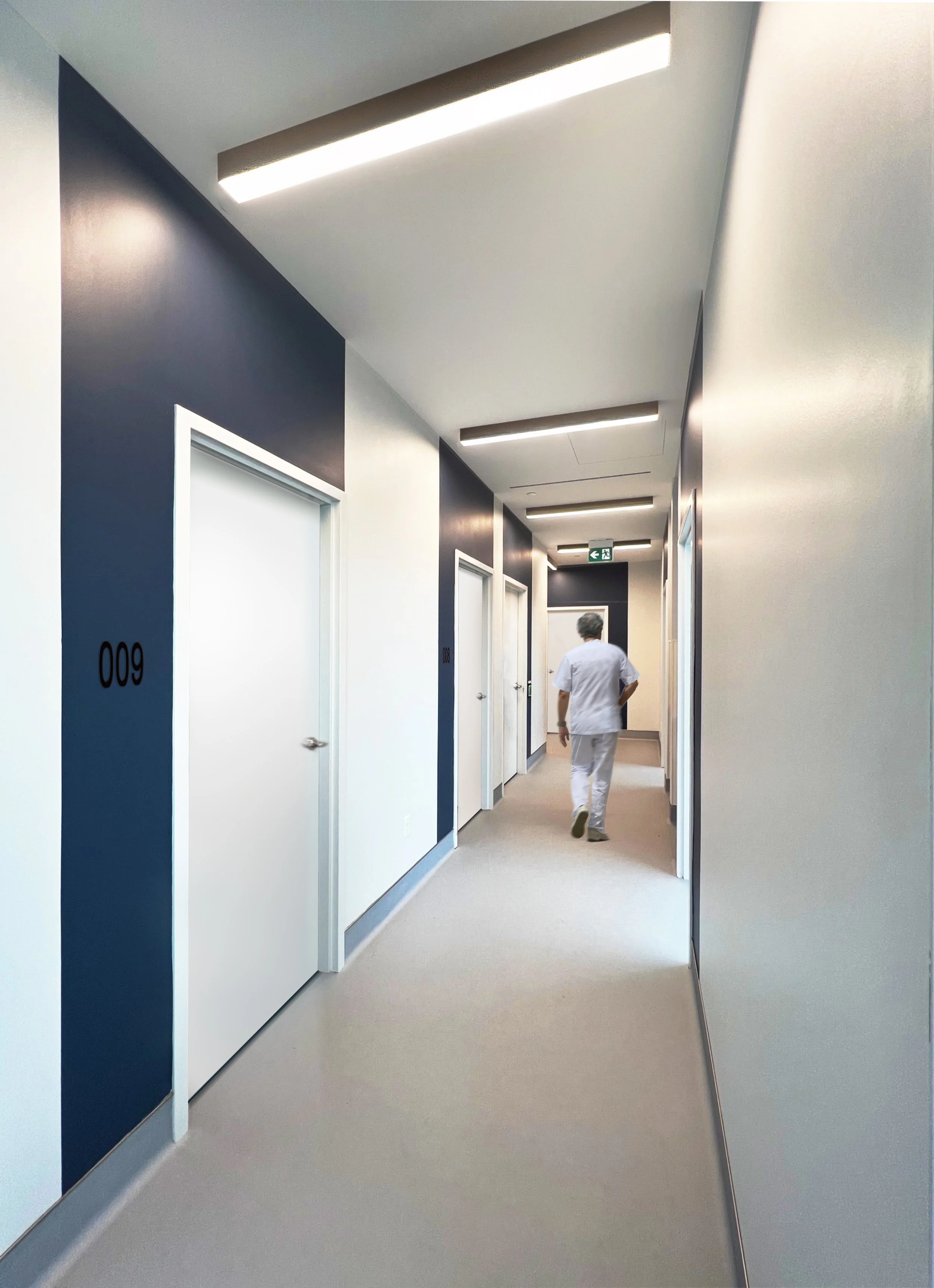 Hospital corridor in Toronto with white walls, dark blue accent wall, and multiple white doors. Accent ceiling lights that facilitate wayfinding. Inspiration for Miami, Park City, Dallas and Texas. Salutogenic design, human flow, healthcare design. 