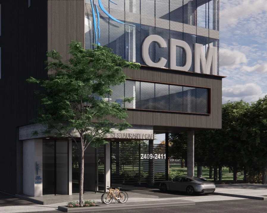 Modern building with large CM letters, a tree in front, a bicycle parked nearby, and a parking lot with a car. Education architecture. wellbeing and flow. wayfinding. salutogenic design. Inspiration for Toronto, Dallas, Texas, Miami, and Park city. 