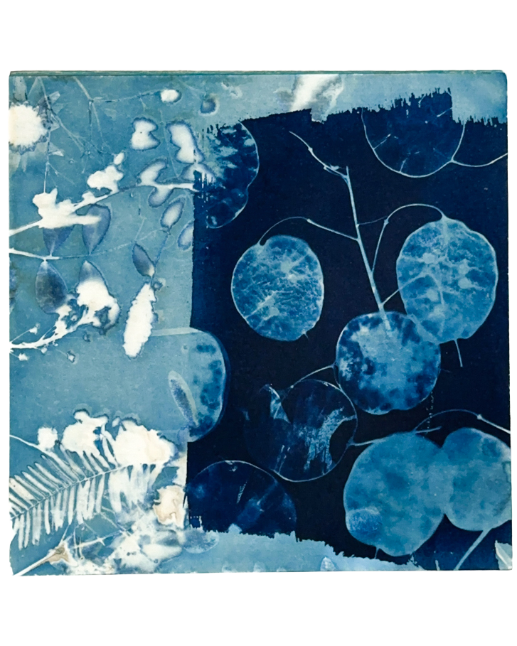 A blue-toned abstract art piece featuring circular shapes, leafy patterns, and textured details.