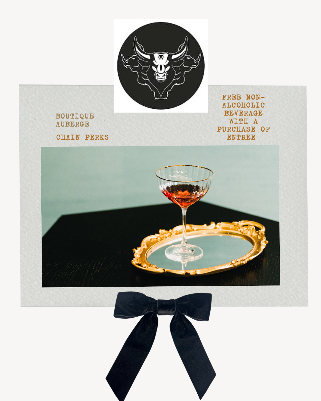 boutique auberge logo. black velvet ribbon. Champagne glass on mirror tray. long live the guest. chain perk