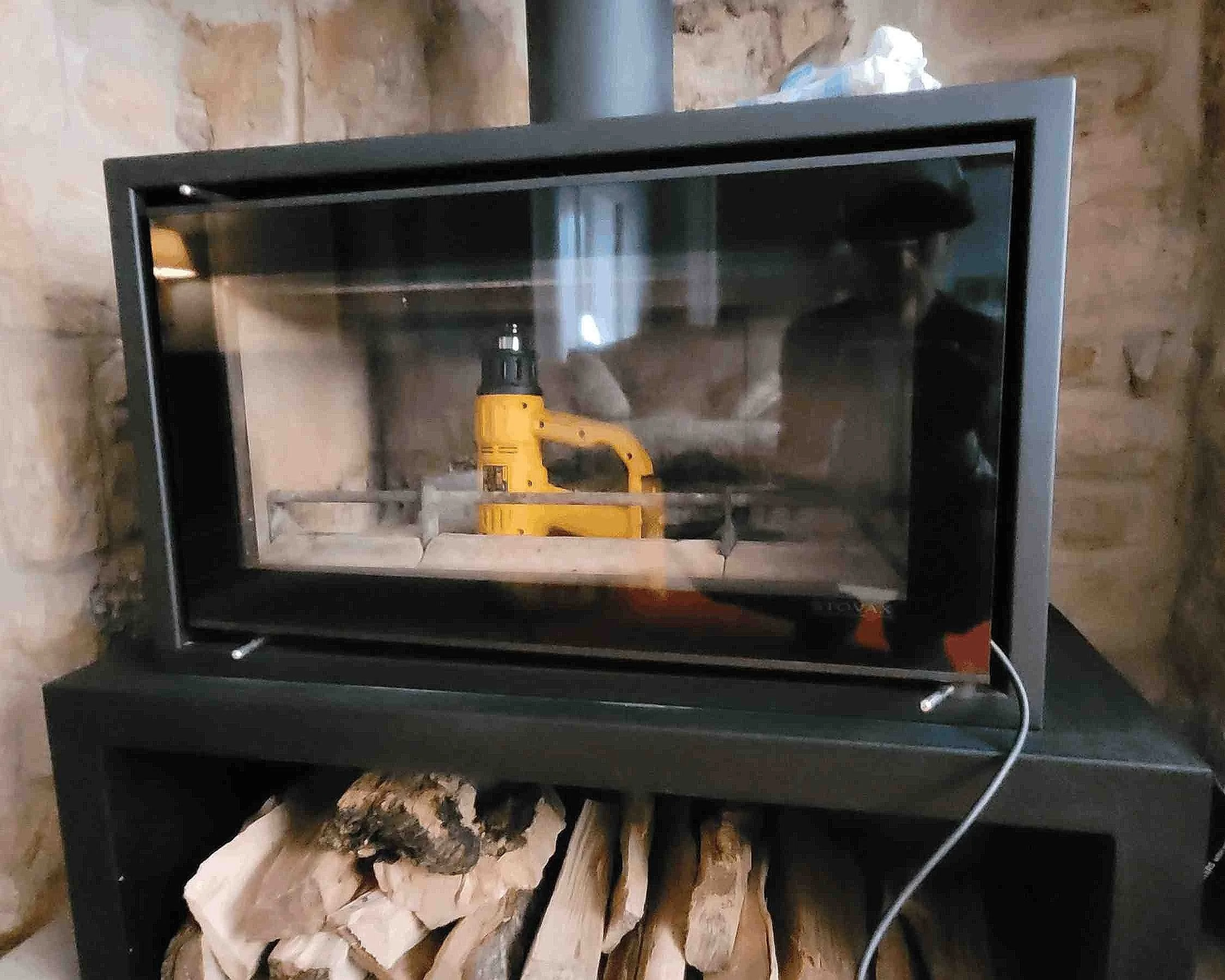 Post sweep warming of the flu, so I can perform a draw test on the stove, in Blaydon