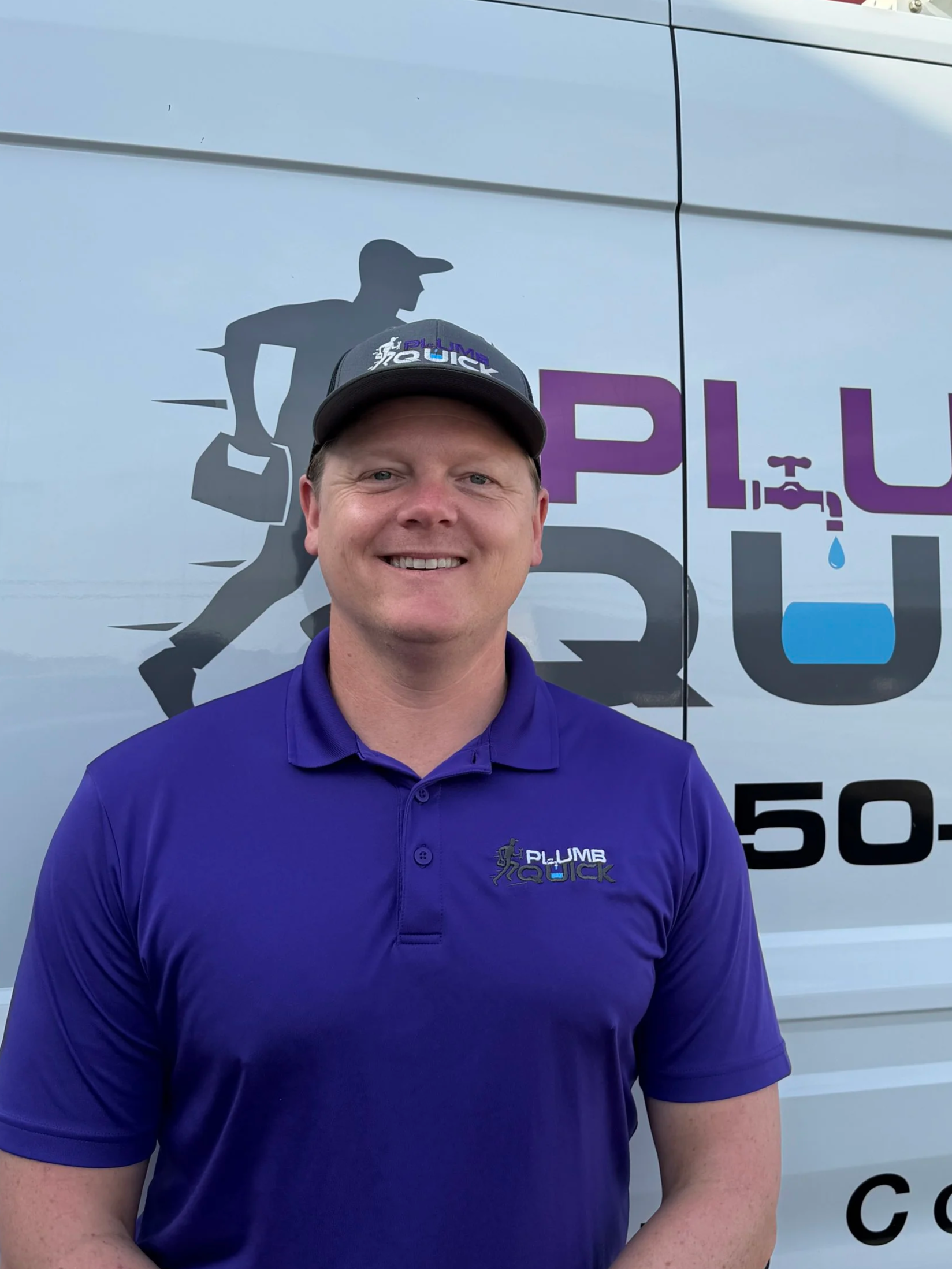 Robert Lacey, owner of Plumb Quick, standing in front of a company service vehicle in Plano Texas
