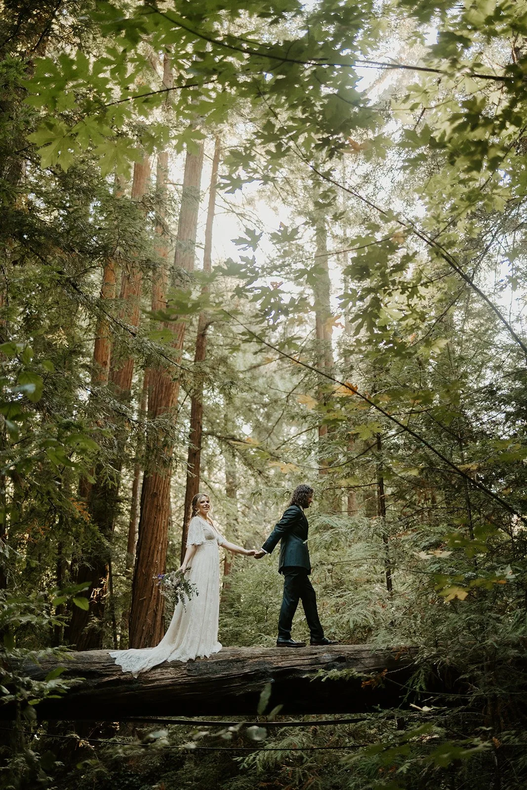 Chiara and Matt during their Big Sur redwood wedding with day-of coordination by Love in Bloom Events