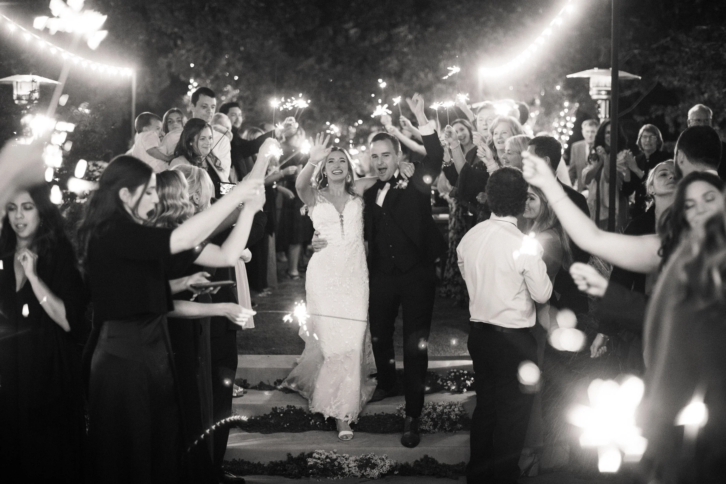 Pebble Beach California partially planned service with guests lighting sparklers 