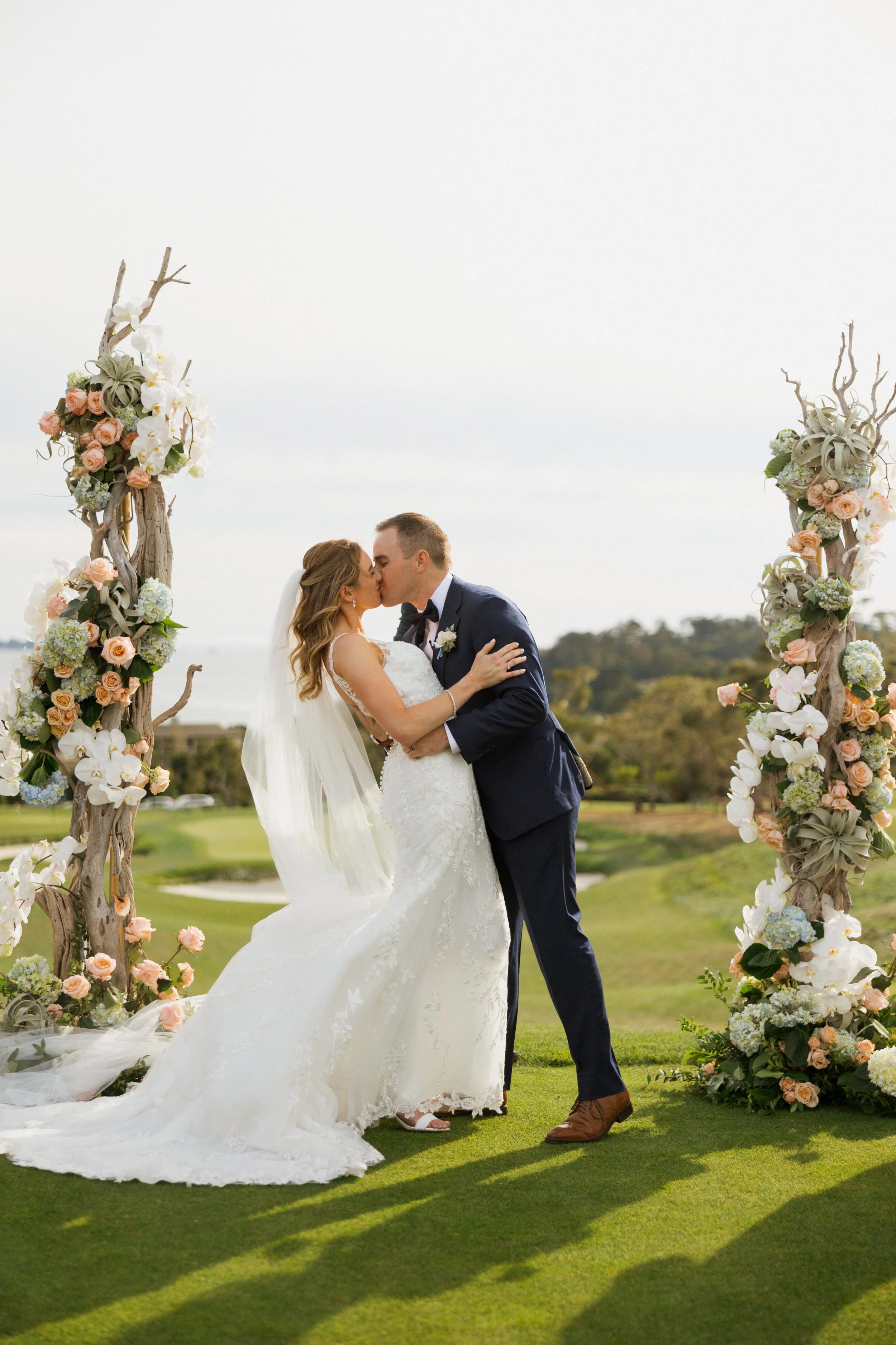 Wedding details and florals from Tierney and Robert's Pebble Beach celebration