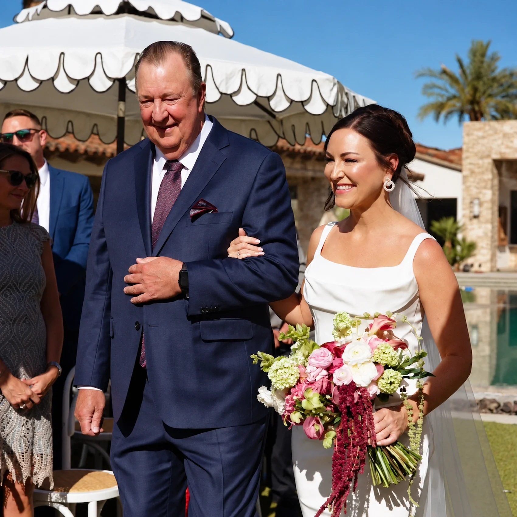 Kristin_and_Brian_Palm_Springs_Wedding_Father_Daughter_Walking.webp